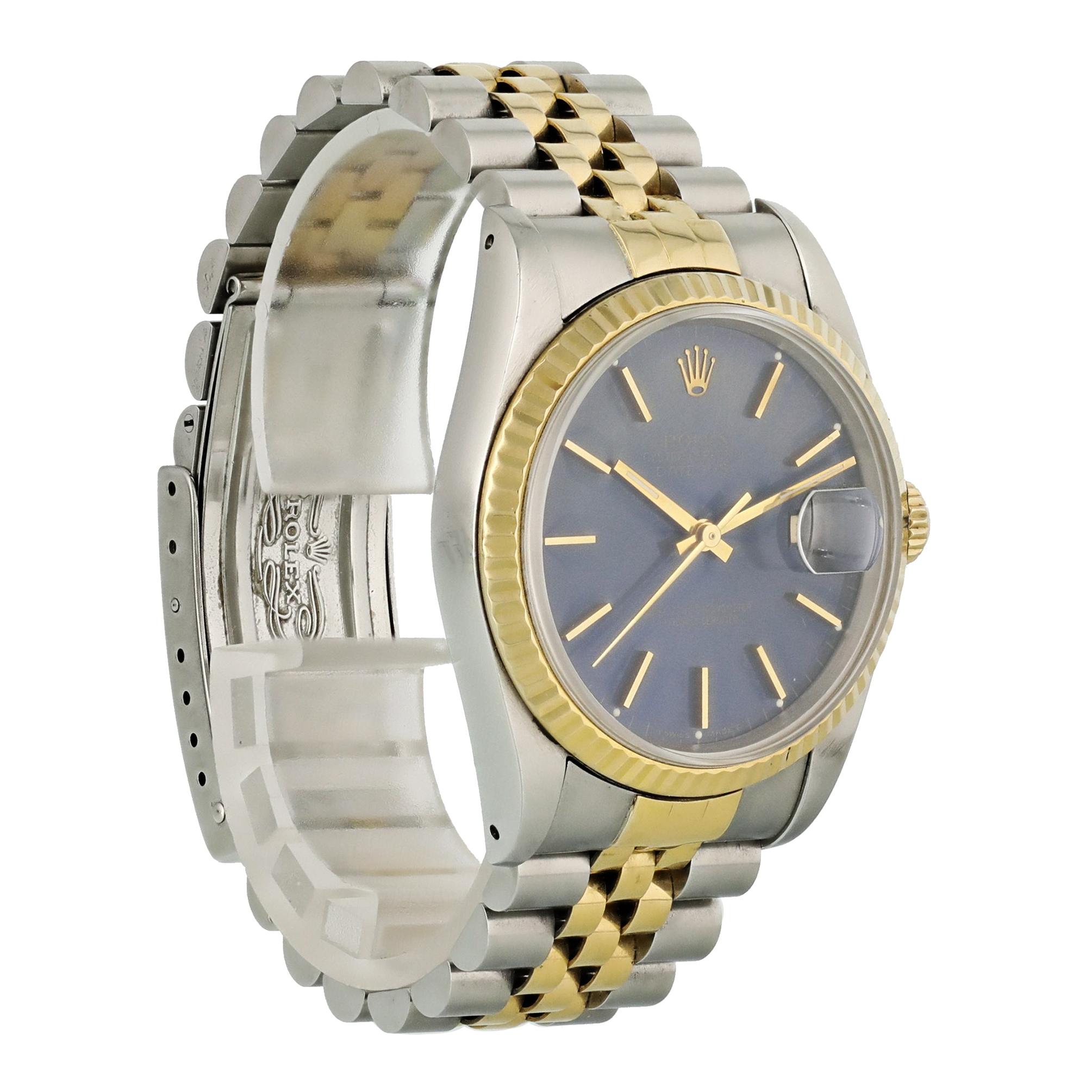 Rolex Datejust 16233 Men Watch. 
36mm Stainless Steel case. 
Yellow Gold Stationary bezel. 
Black dial with gold hands and index hour markers. 
Minute markers on the outer dial. 
Date display at the 3 o'clock position. 
Stainless Steel Bracelet with