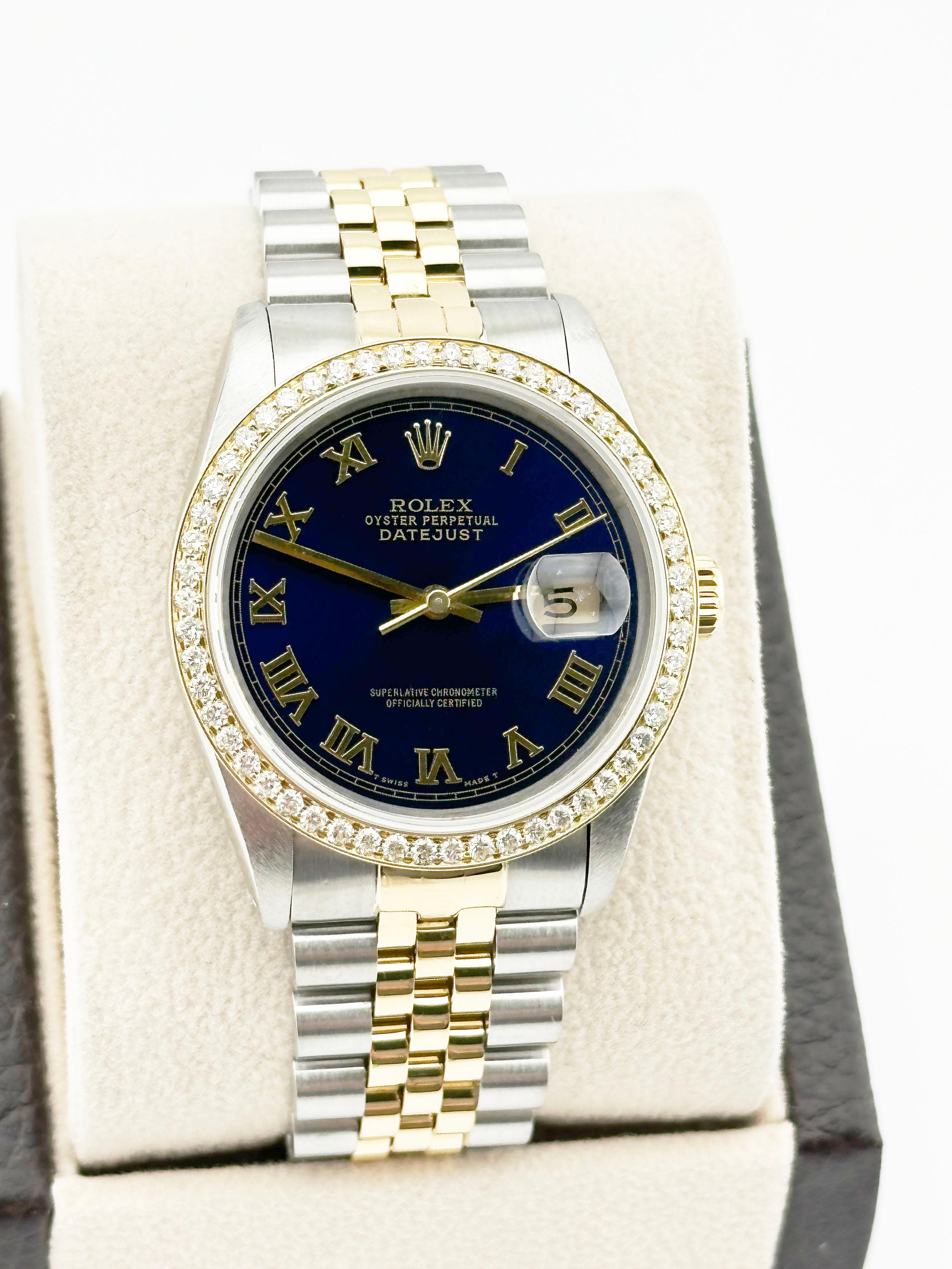 Style Number: 16233



Serial: X391***



Year: 1991

 

Model: Rolex Datejust 

 

Case Material: Stainless Steel 

 

Band: 18K Yellow Gold & Stainless Steel Jubilee Band 

  

Bezel: Custom Yellow Gold Diamond Bezel 

  

Dial: Blue Roman 

