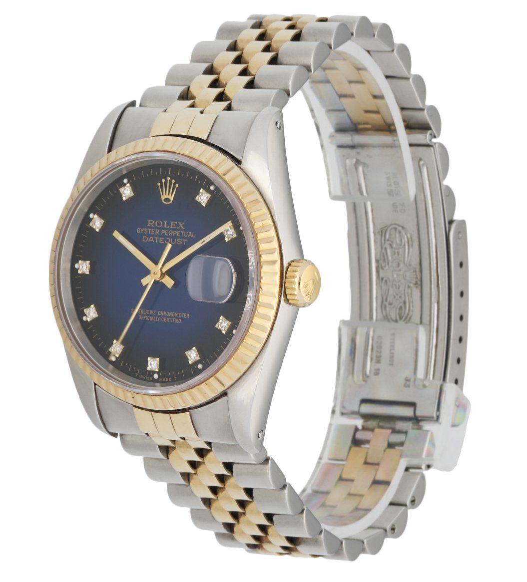 Rolex Datejust 16233 Men's Watch. 36mm Stainless Steel case. 18K Yellow GoldÂ fluted bezel. Factory Blue Vignette dial with diamond hour markers and golden hands. Minute markers on the outer dial. Date display at the 3 o'clock position. Two tone,