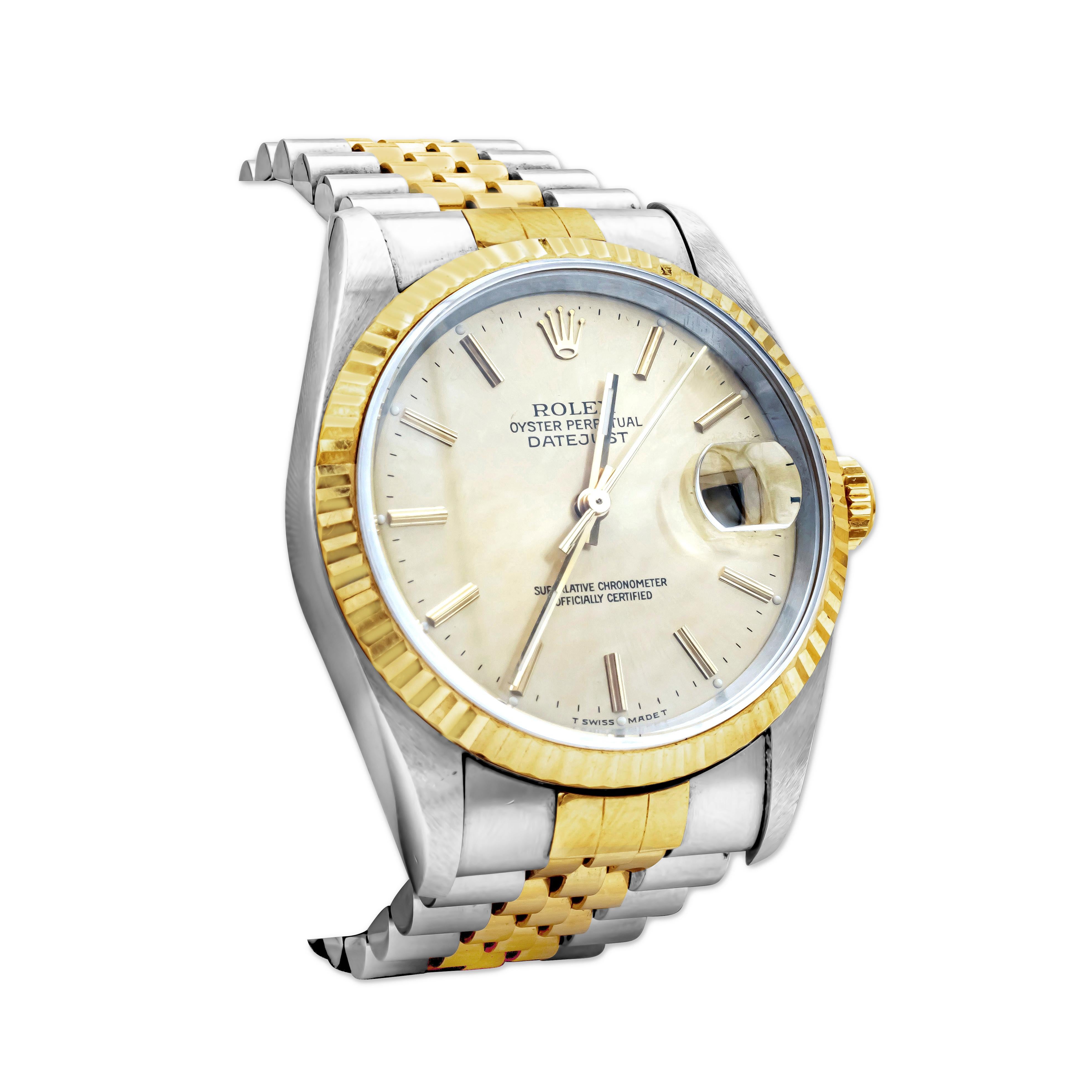 A classic Rolex Datejust (16233), featuring a self-winding automatic watch with a 36 mm stainless steel case and an 18K yellow gold fluted bezel. A Rolex jubilee of 18K yellow gold and stainless steel with deployment buckle. Other features include a