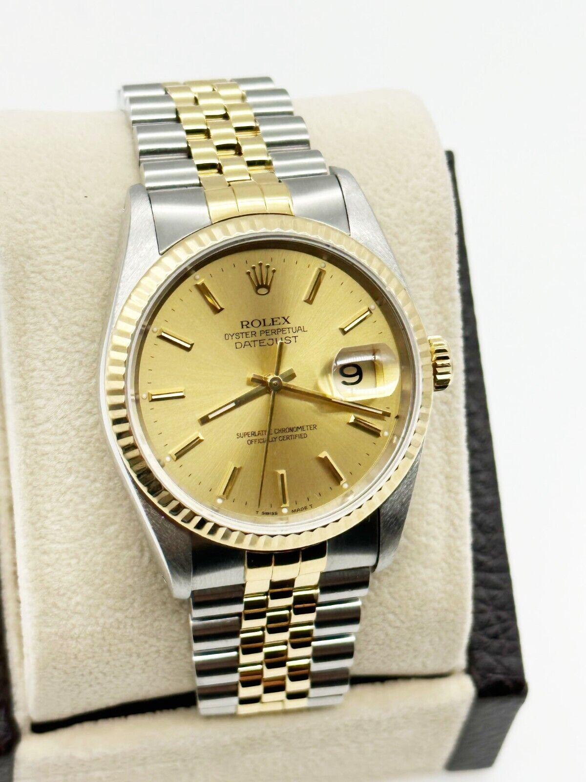 Style Number: 16233

Serial: X503***

Year: 1991

Model: Datejust 

Case Material: Stainless Steel 

Band: 18K Yellow Gold & Stainless Steel 

Bezel: 18K Yellow Gold
 
Dial: Champagne 

Face: Sapphire Crystal 

Case Size: 36mm

Includes: 

-Elegant