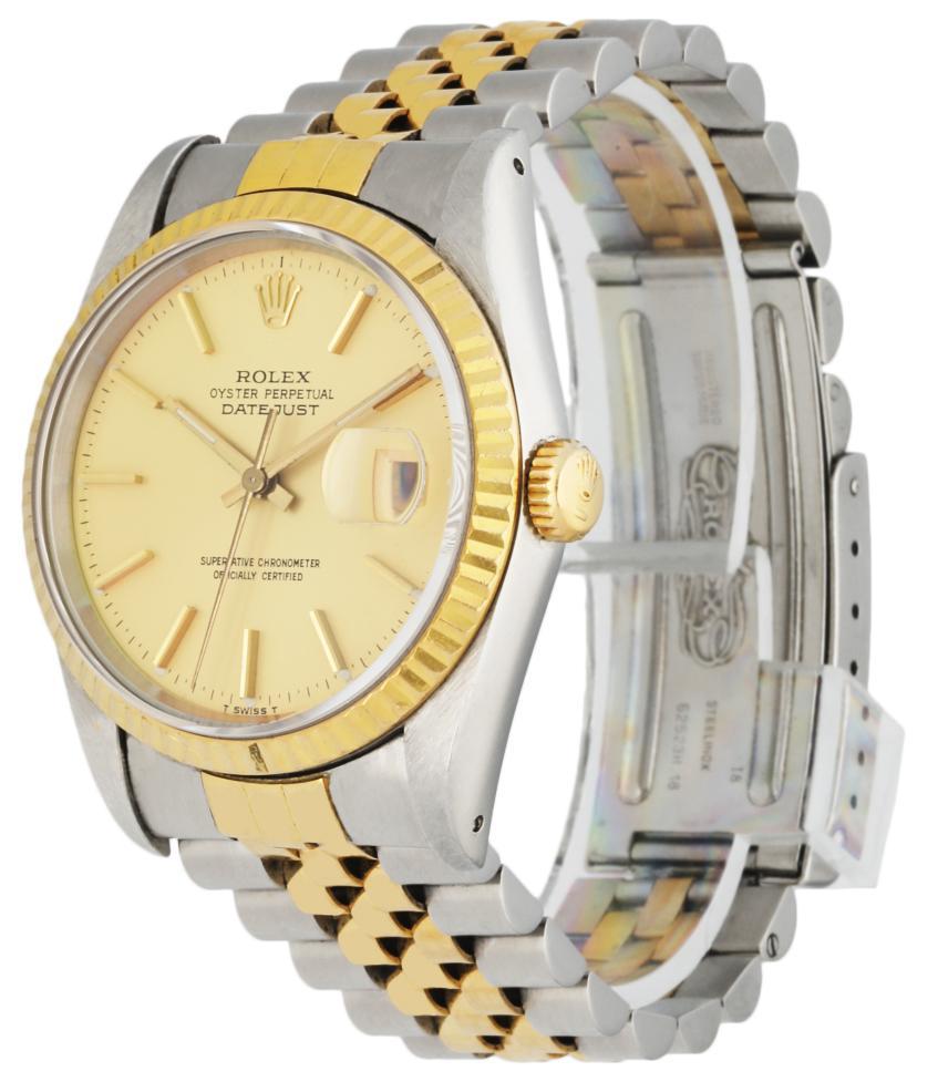 
Rolex Datejust 16233 Men's Watch. 36mm Stainless Steel case. 18K Yellow Gold fluted bezel. Champagne dial with gold hands and gold index hour markers. Minute markers on the outer dial. Date display at the 3 o'clock position. Stainless Steel & 18K