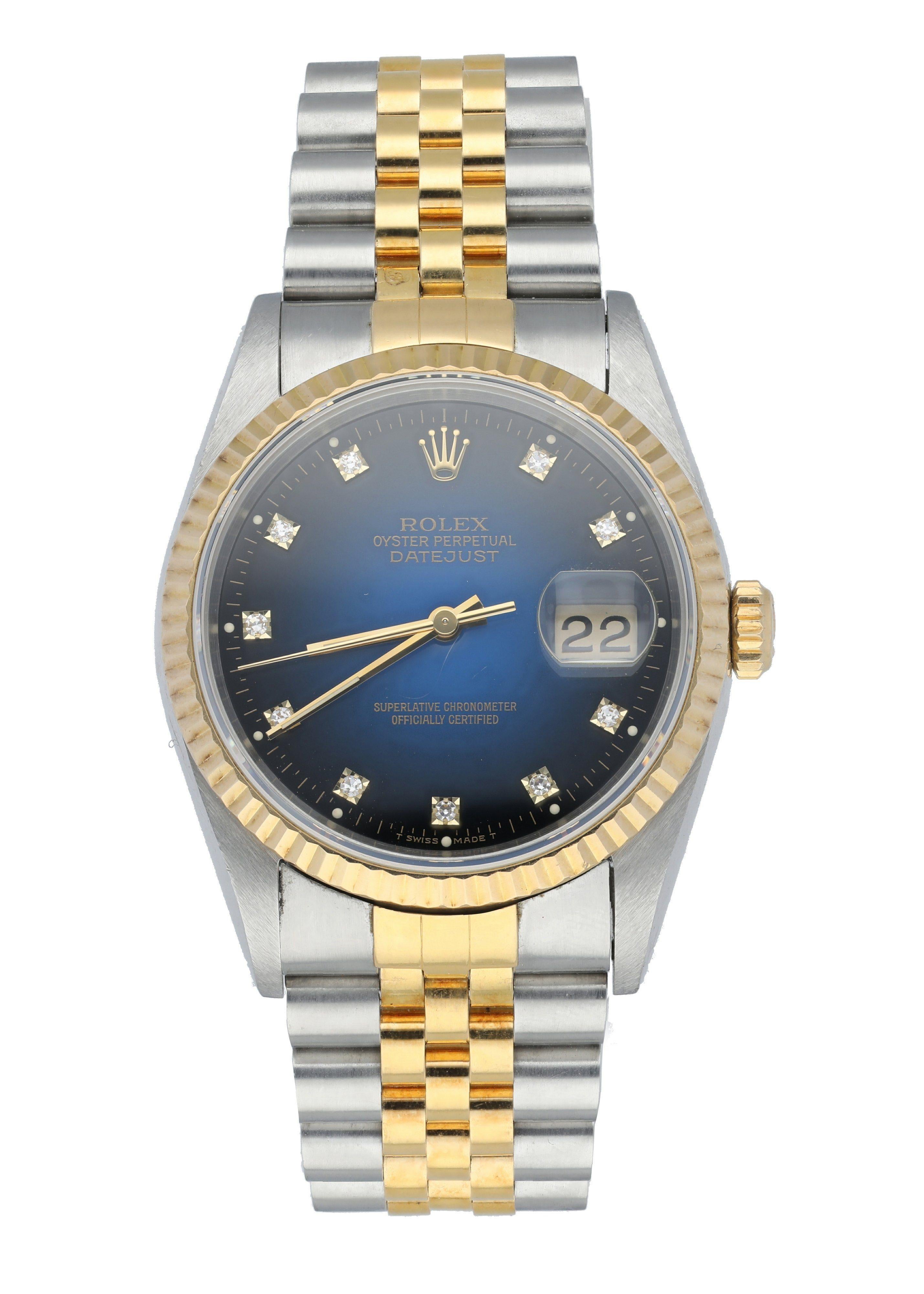 Rolex Datejust 16233 Men's Watch. 
36mm Stainless Steel case. 
Yellow Gold fluted bezel. 
Blue vignette dial with gold hands and factory set diamond hour markers. 
Minute markers on the outer dial. 
Date display at the 3 o'clock position. 
Two-Tone