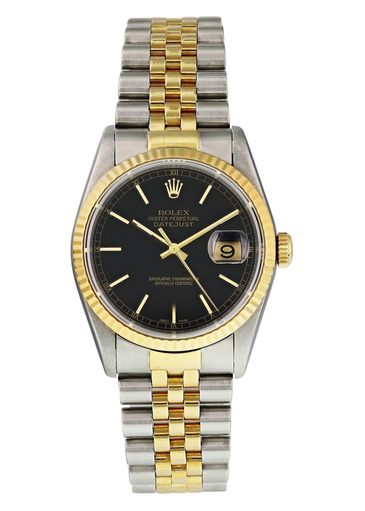 Rolex Datejust 16233 Men Watch. 
36mm Stainless Steel case. 
Yellow Gold fluted bezel. 
Black dial with luminous gold hands and index hour markers. 
Roman numeral hour markers on the outer dial. 
Minute markers on the outer dial. 
Date display at