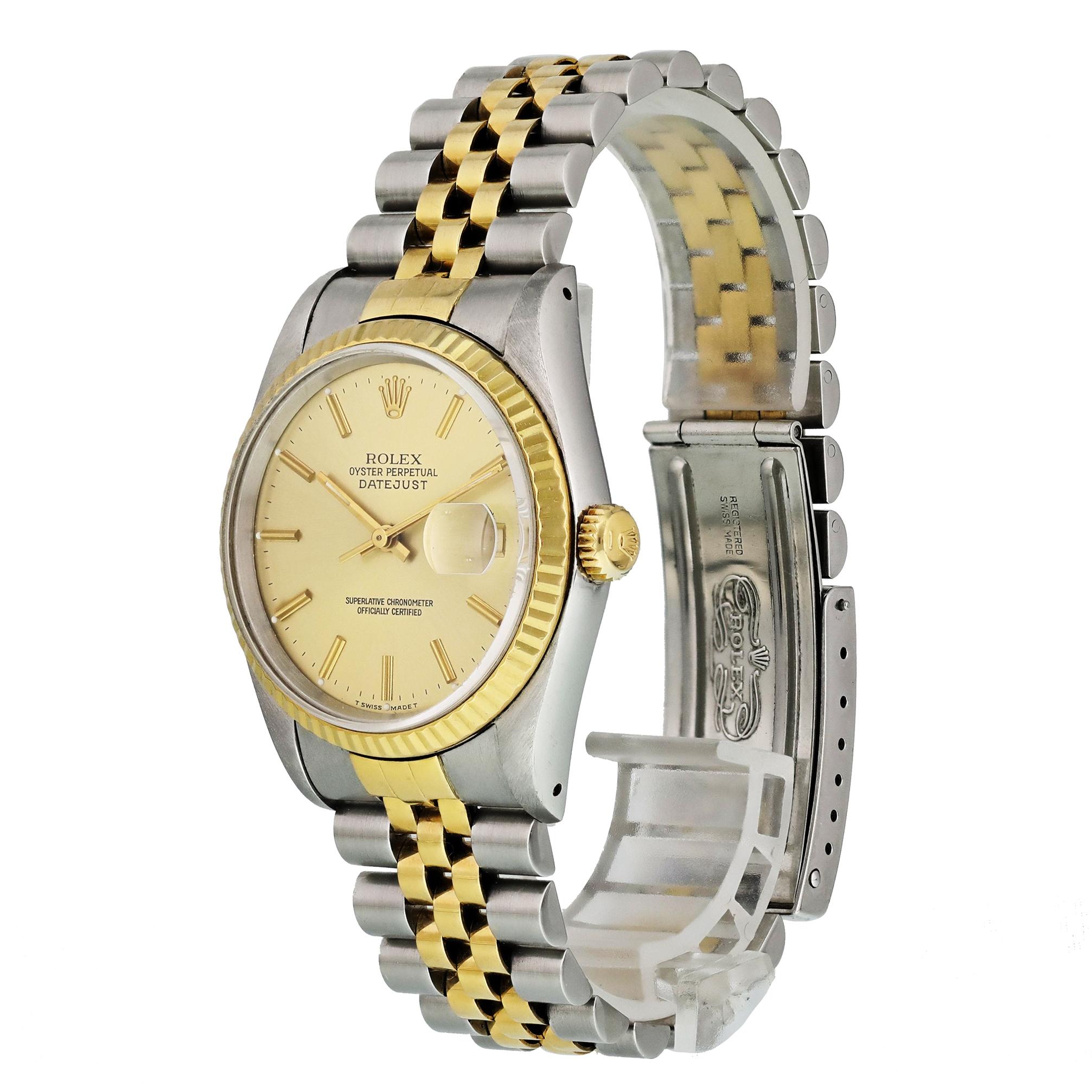 Rolex Datejust 16233 Men Watch. 
36mm Stainless Steel case. 
Yellow Gold Stationary bezel. 
Champagne dial with Luminous gold hands and index hour markers. 
Minute markers on the outer dial. 
Date display at the 3 o'clock position. 
Stainless Steel