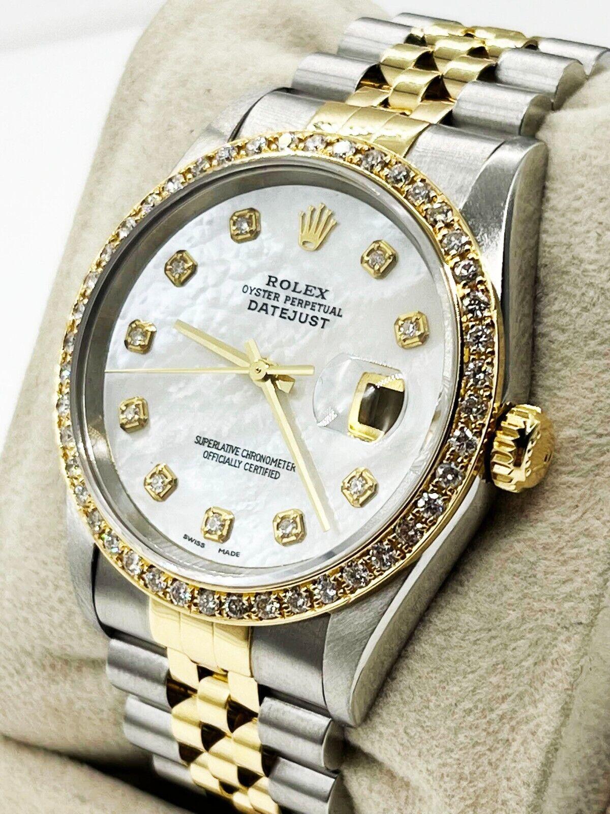 Style Number: 16233

Serial: P220***

Year: 2000

Model: Datejust

Case Material: Stainless Steel 

Band: 18K Yellow Gold & Stainless Steel 

Bezel: Custom Diamond Bezel 

Dial: Refinished Mother of Pearl Diamond Dial 

Face: Sapphire Crystal 

Case