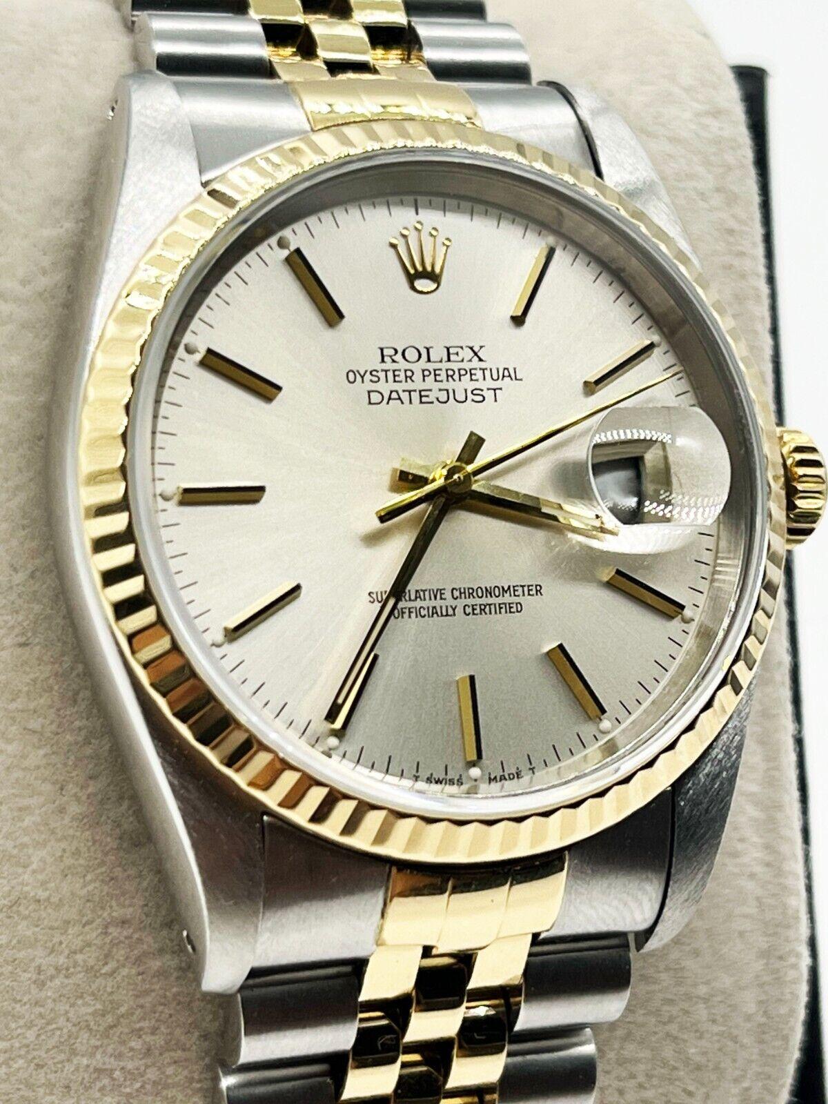 Style Number: 16233
Serial: L538***
Year: 1989
Model: Datejust 
Case Material: Stainless Steel 
Band: 18K Yellow Gold & Stainless Steel 
Bezel: 18K Yellow Gold 
Dial: Silver
Face: Sapphire Crystal 
Case Size: 36mm 

Includes: 

-Elegant Watch