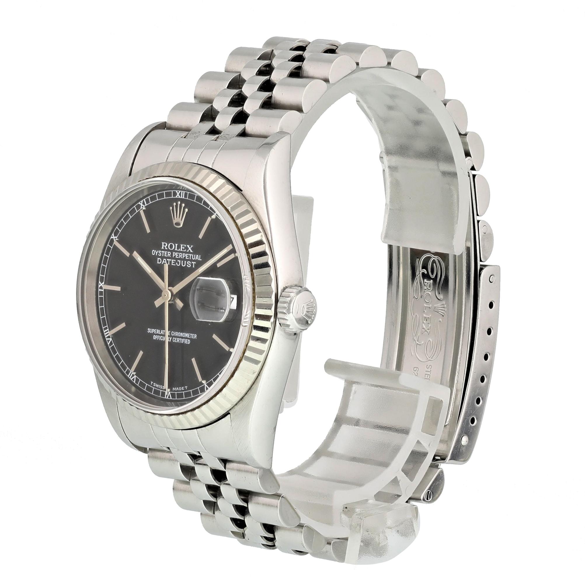 Rolex Datejust 16234 Men Watch. 
36mm Stainless Steel case. 
White Gold Stationary bezel. 
Black dial with Luminous hands and index hour markers. 
Minute markers on the outer dial. 
Date display at the 3 o'clock position. 
Stainless Steel Jubilee