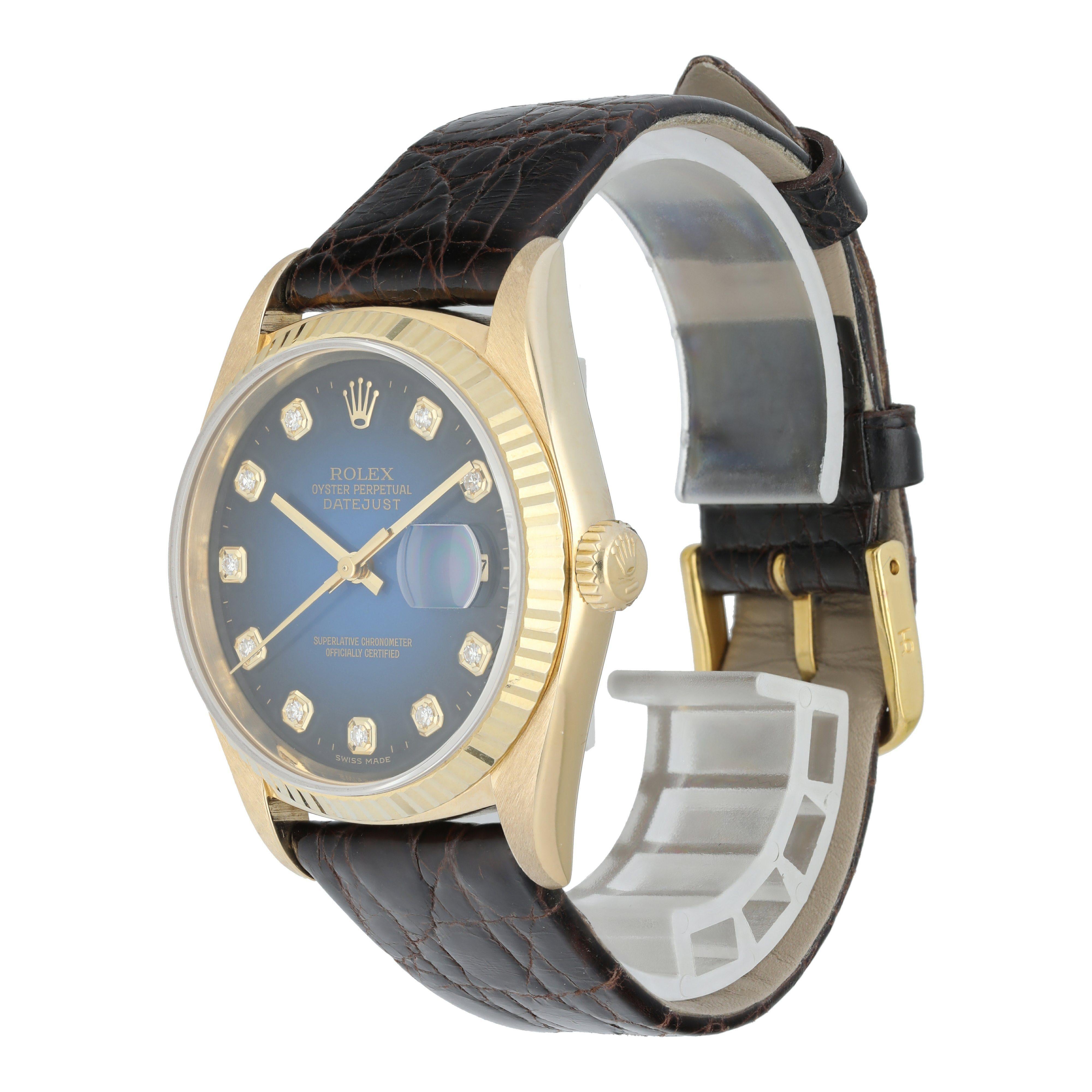 Rolex Datejust 16238 Men's Watch
36mm 18k Yellow gold case and fluted bezel. 
Yellow Gold fluted bezel. 
Factory Blue Vignette dial with diamond hour markers.
Minute markers on the outer dial.
Date display at the 3 o'clock position. 
Brown Leather