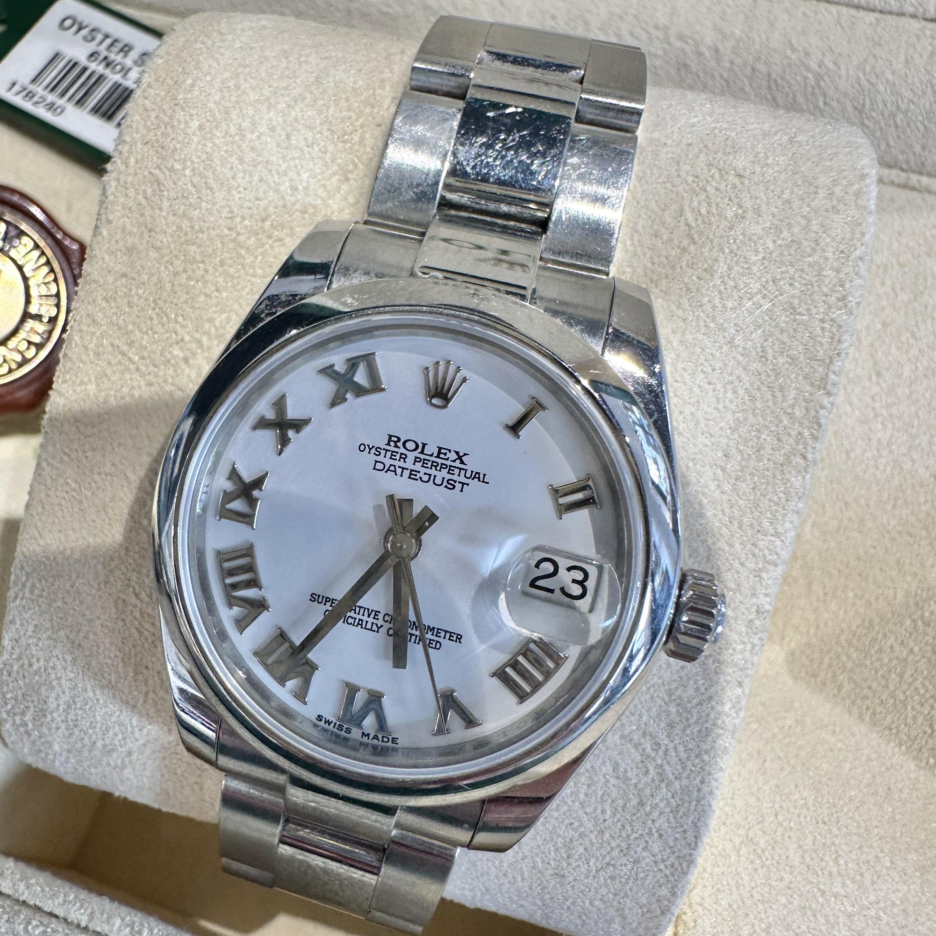 Brand: Rolex
Model Name: Datejust
Model Number: 178240
Movement: Mechanical Automatic
Case Size: 31 mm
Case Material: Stainless Steel
Bracelet: Oyster; Stainless Steel
Dial: White, Roman Numeral Hour Markers
Bezel: Smooth, Stainless Steel
Year:
