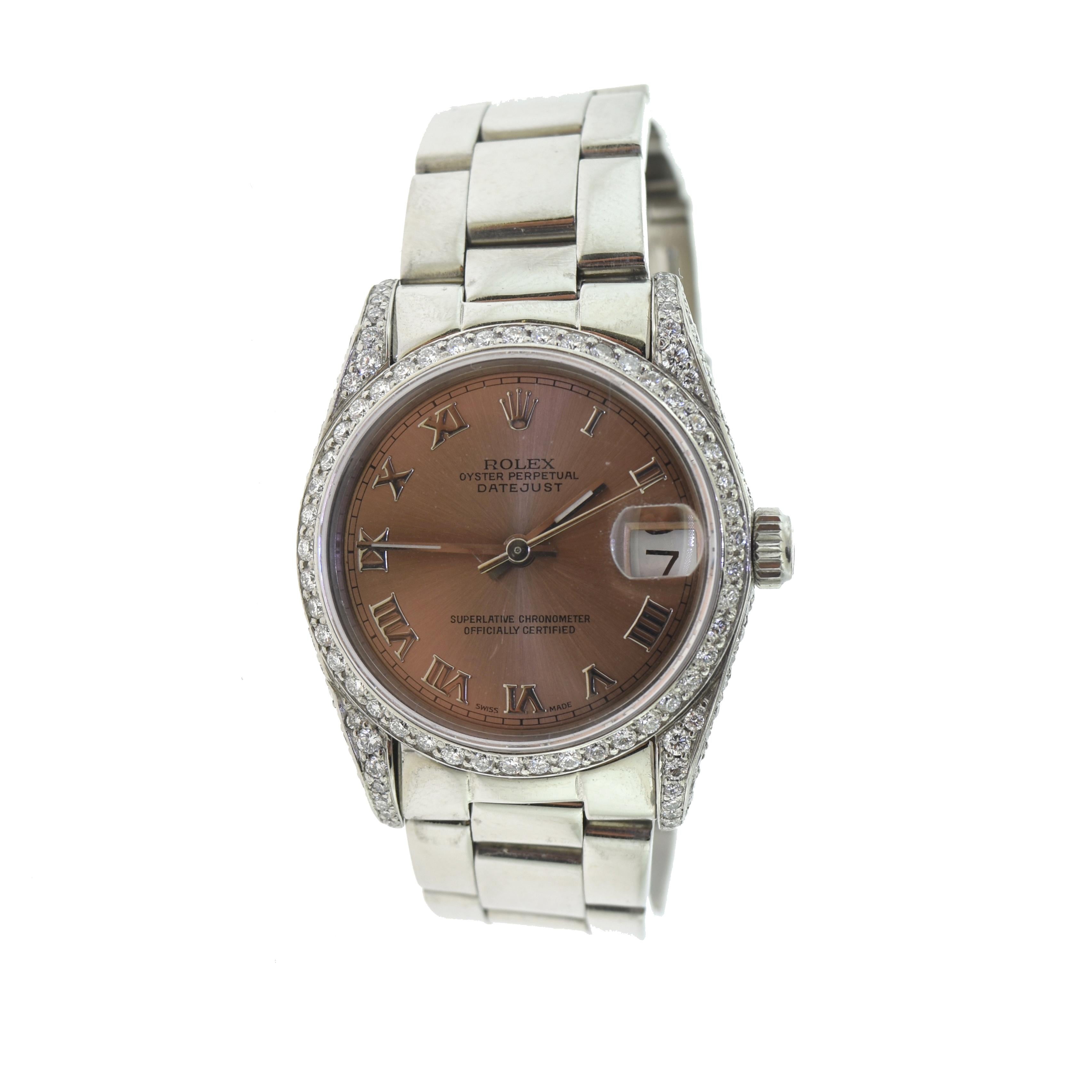 Brand: Rolex

Model Name: Datejust

Model Number: 178274

Movement: Automatic

Case Size: 31 mm

Case Material: Stainless Steel

Bezel: Diamond

Dial Color: Pink Metallic

Hour Markers: Roman Numerals

Bracelet: ​​​​​​​Stainless Steel

Features: