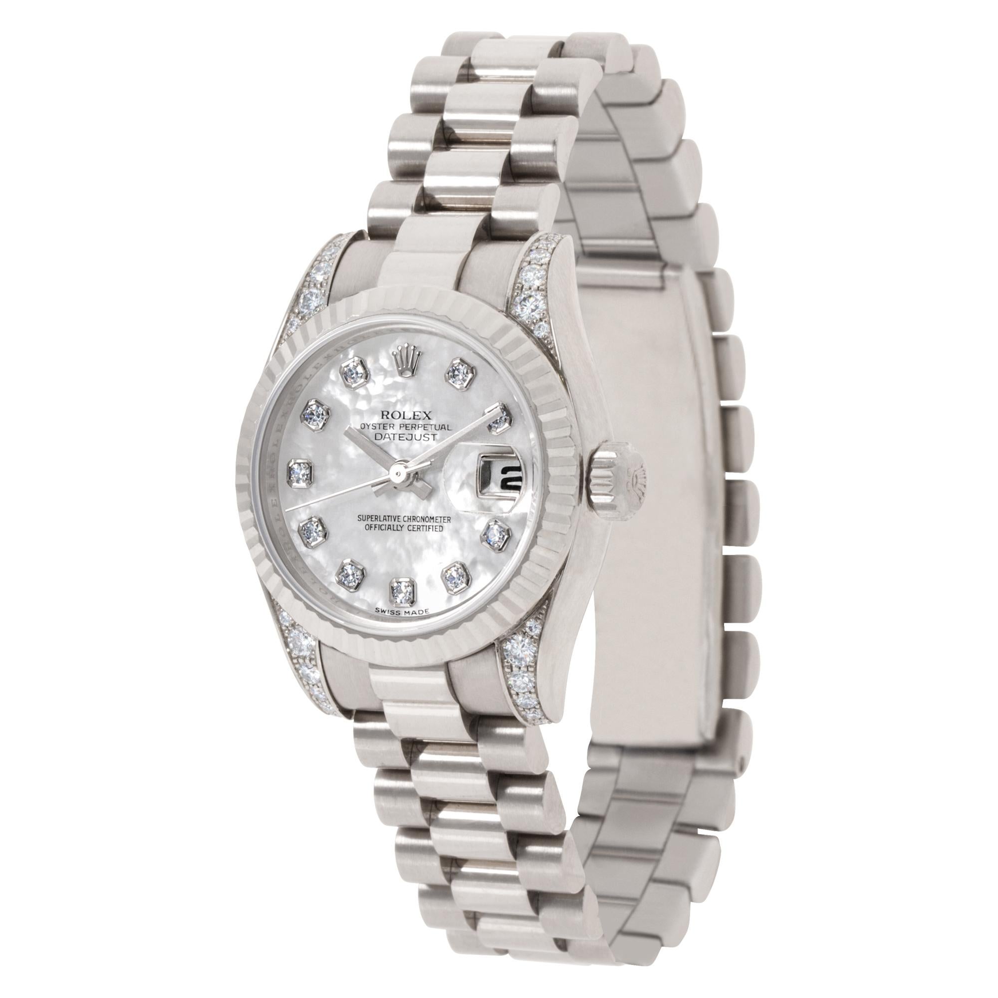 Rolex Datejust in 18k white gold with factory original mother of pearl diamond dial and diamond lugs. Auto w/ sweep seconds and date. 26 mm case size. Circa 2008. Ref 179239. Fine Pre-owned Rolex Watch.

Certified preowned Dress Rolex Datejust