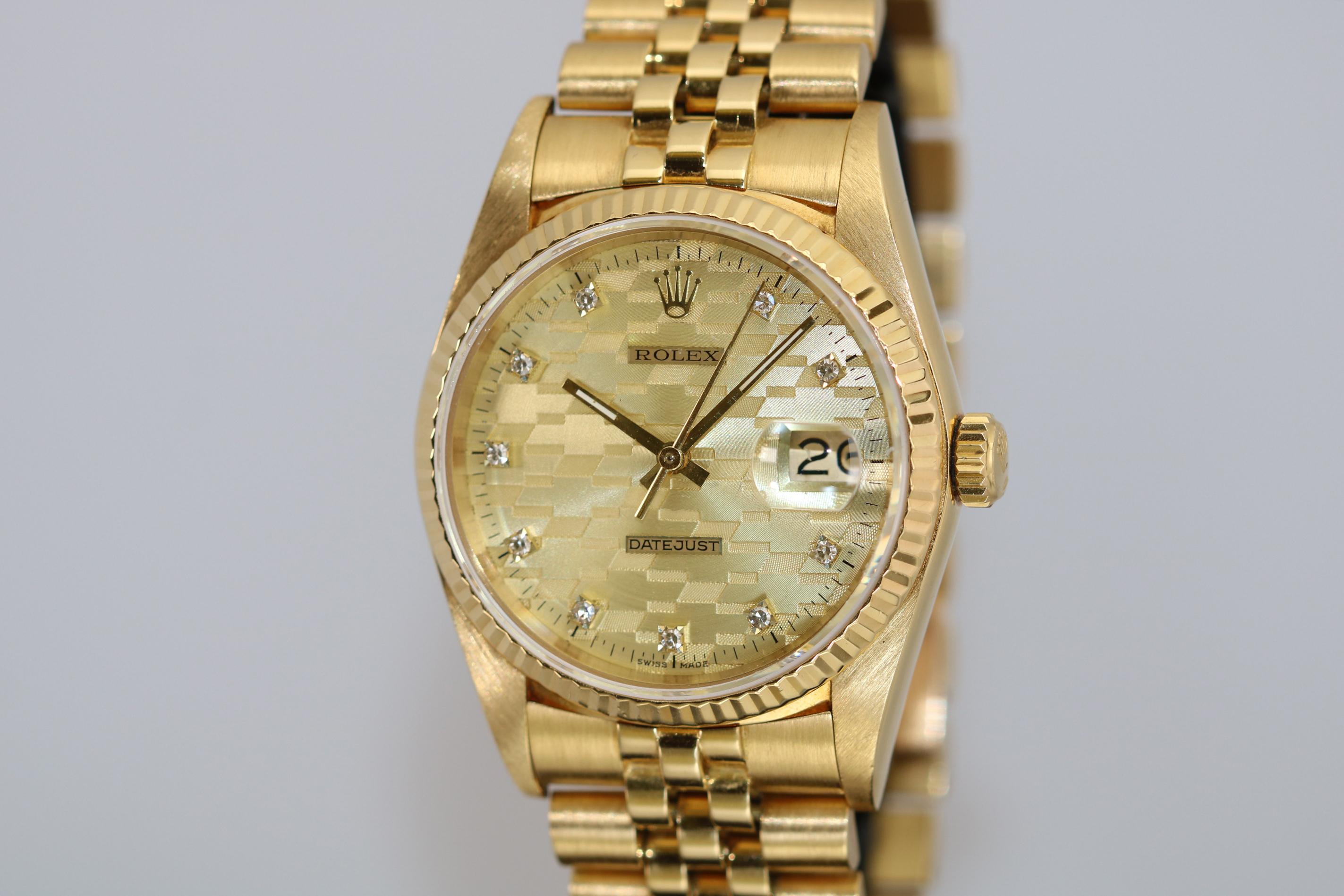 The champagne dial on this Rolex Datejust has a great design using the Chevrolet logo aka Chevy and diamonds for the hour markers. This comes on a Rolex Jubilee gold bracelet with hidden clasp. 36mm circa 1986