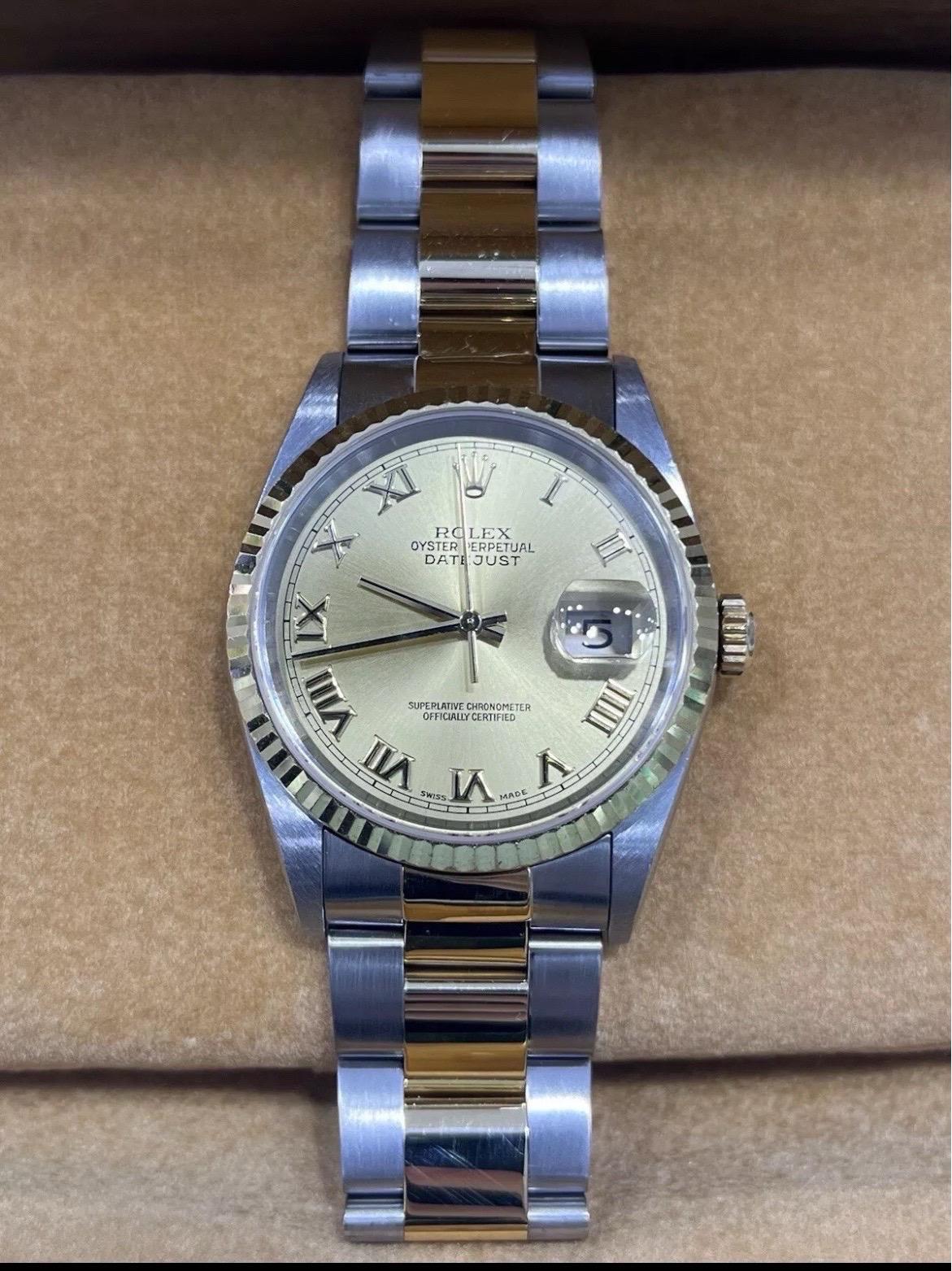 An icon of timeless elegance, this Rolex Datejust 36mm pairs classic luxury with everyday versatility. Crafted from Rolex’s signature Rolesor combination of 18k yellow gold and stainless steel, it features a beautifully refined champagne dial