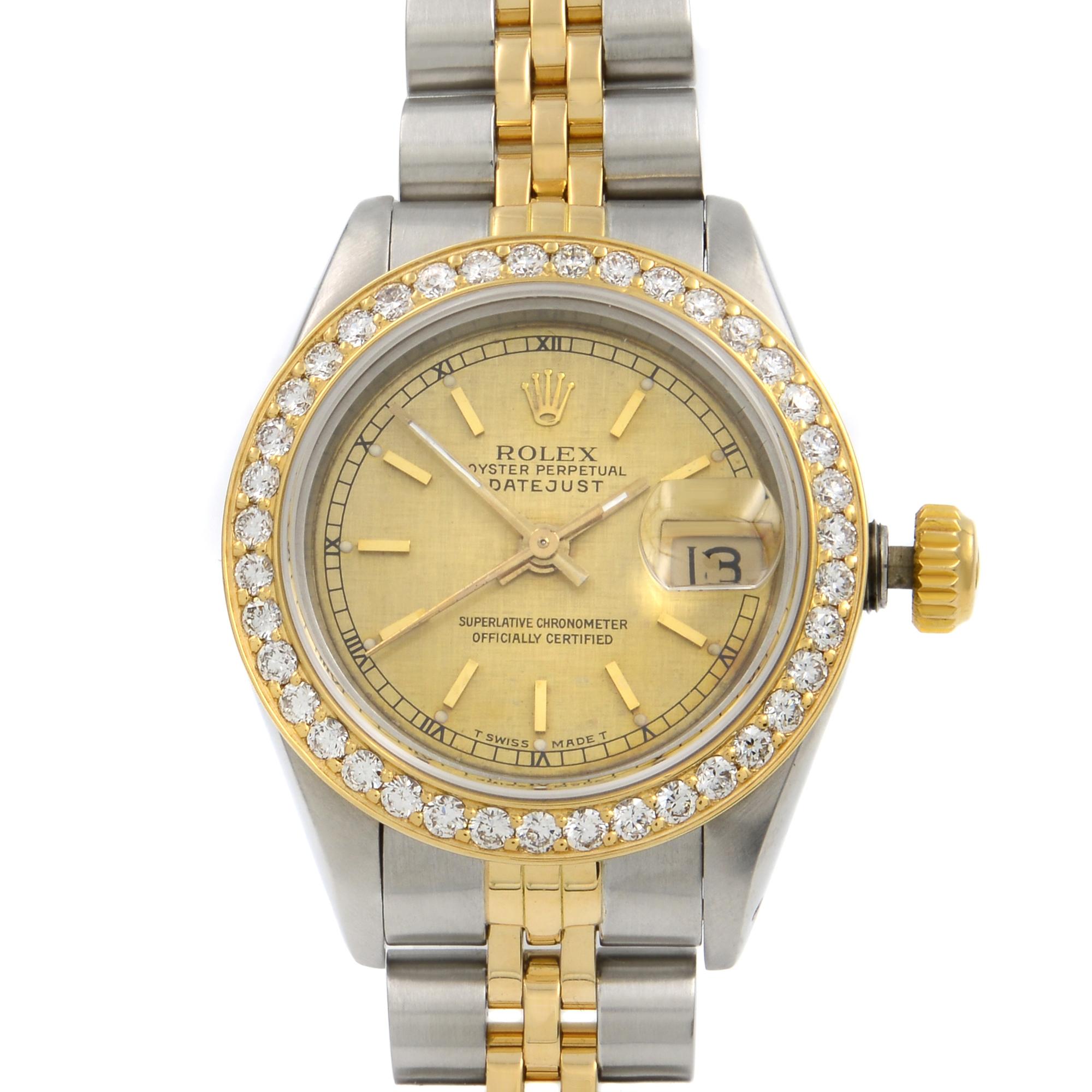 Custom Diamond Bezel. 1-carat Diamond Bezel.  Rolex Engraving on the back case.  Comes without manufacturer's box and papers. Covered by a 1-year Chronostore warranty.
Details:
Model Number 69173
Brand Rolex
Department Women
Style Classic,