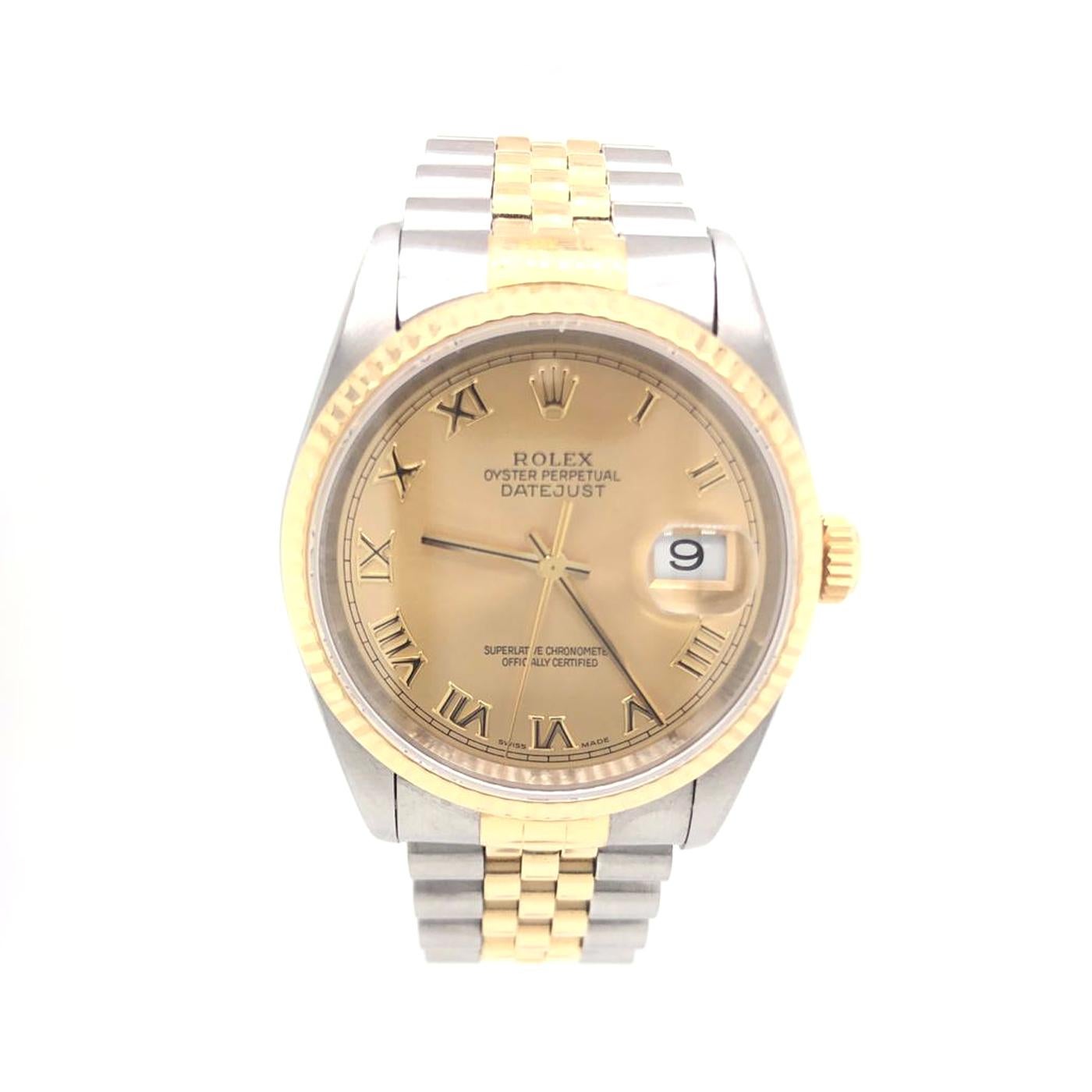 Silver-Tone stainless steel case with a two-tone (silver-tone and gold-tone) yellow gold/stainless steel bracelet. Yellow gold fluted bezel. Gold dial with gold-tone hands and index hour markers. Minute markers around the outer rim. Dial Type: