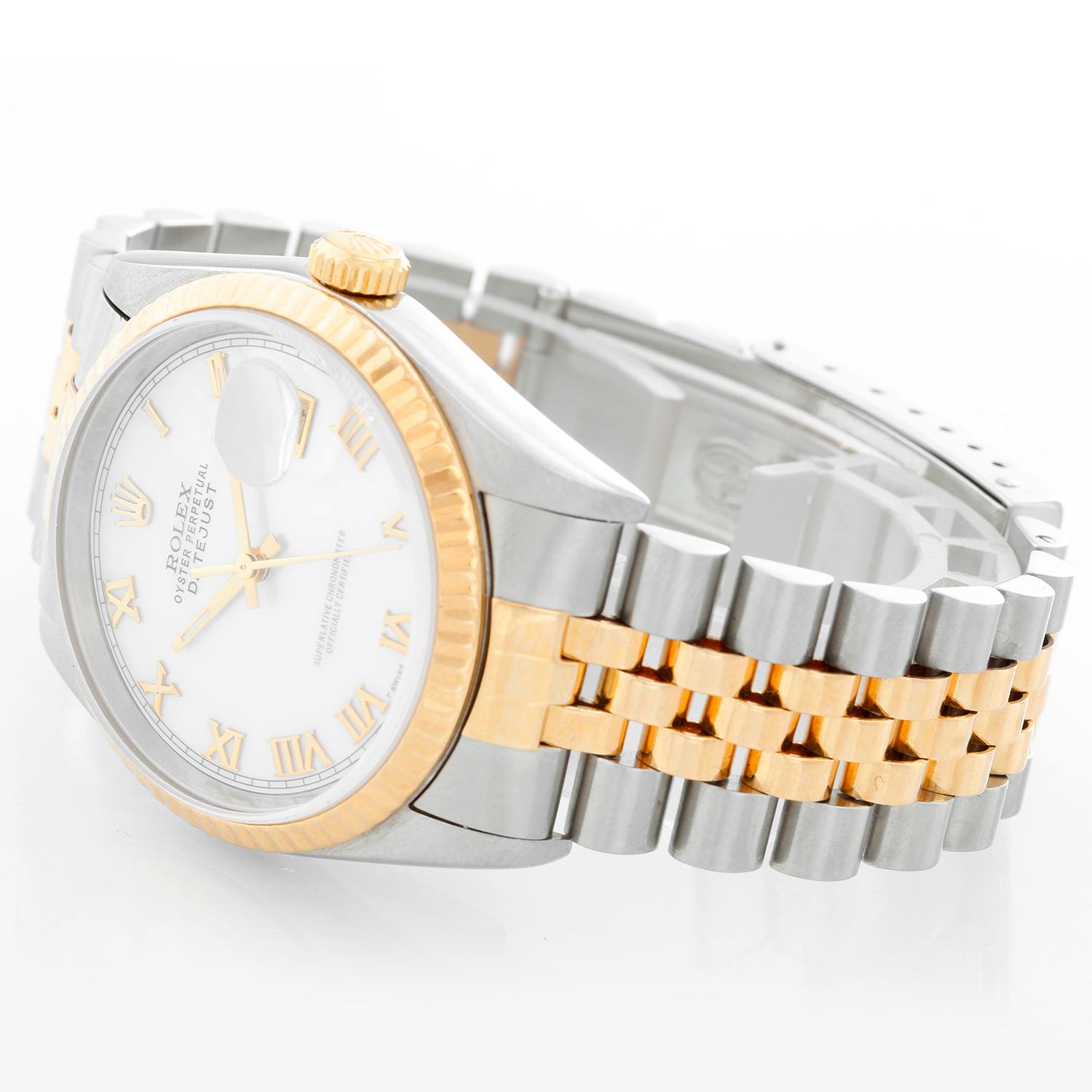 Rolex Datejust 2-Tone Men's Steel & Gold Watch 16233 - Automatic winding, Quickset, sapphire crystal. Stainless steel case with 18k yellow gold fluted bezel (36mm diameter). Custom Mother of Pearl Roman numeral dial. Stainless steel and 18k yellow