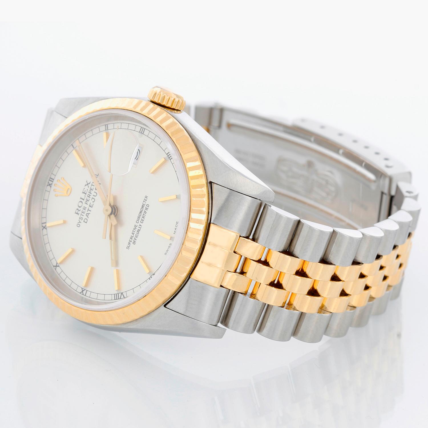 Rolex Datejust 2-Tone Men's Steel & Gold Watch 16233 - Automatic winding, Quickset, sapphire crystal. Stainless steel case with yellow gold bezel (36mm diameter). Silver stick dial . Stainless steel and 18k yellow gold Jubilee bracelet. Pre-owned