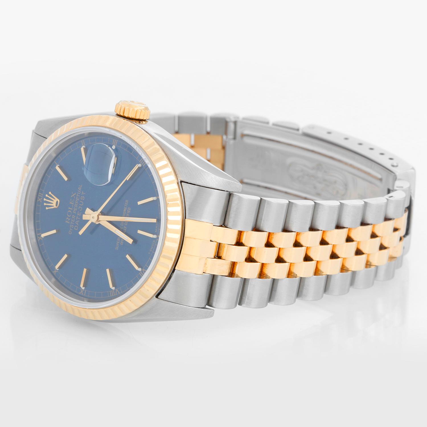 Rolex Datejust 2-Tone Men's Steel & Gold Watch 16233 - Automatic winding, Quickset, sapphire crystal. Stainless steel case with yellow gold bezel (36mm diameter). Blue dial with stick hour markers . Stainless steel and 18k yellow gold Oyster