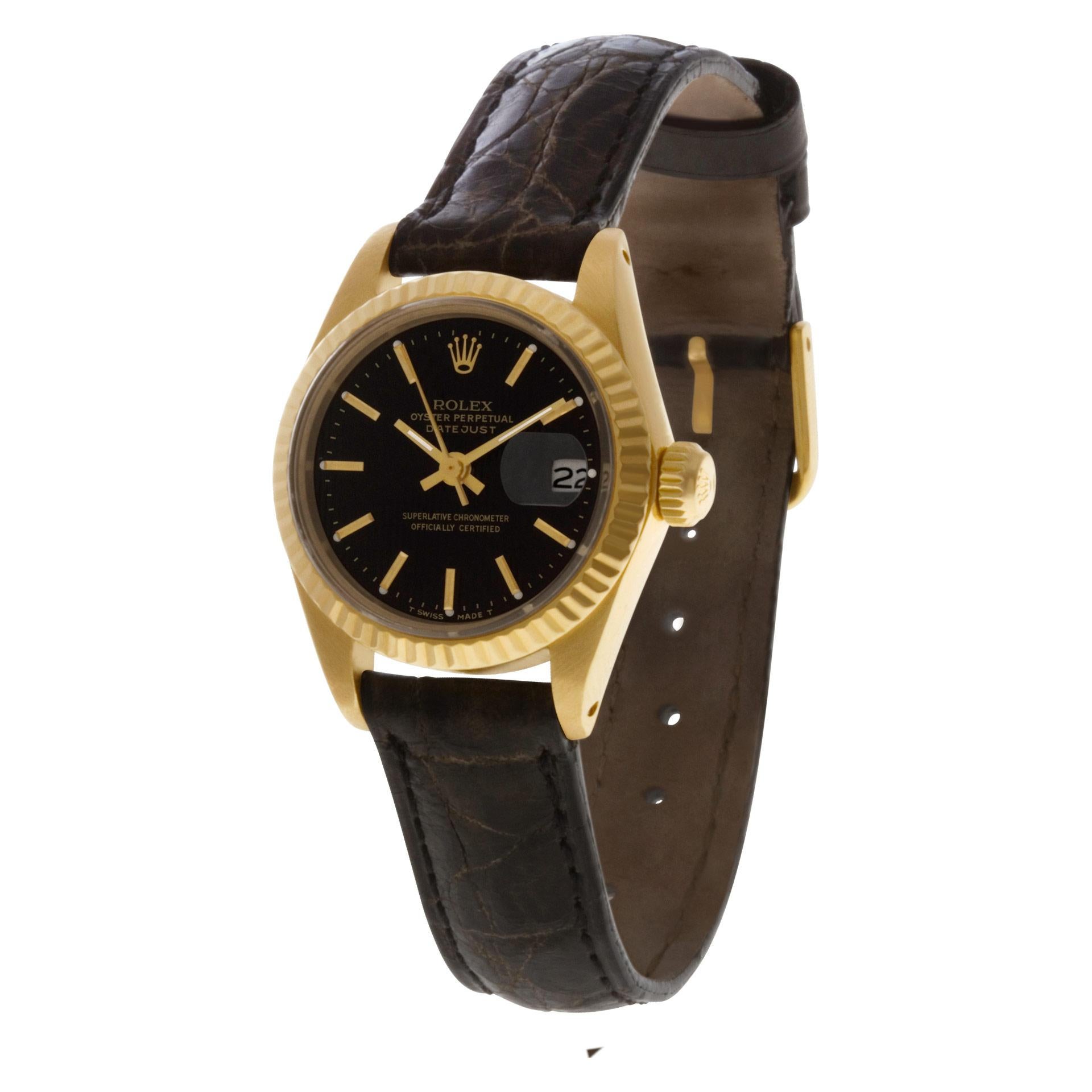 Rolex Datejust in 18k yellow gold with a black tapestry stick dial on a black crocodile strap. Auto with sweep seconds and date. Ref 6917. Circa 1980. Fine Pre-owned Rolex Watch. Certified preowned Rolex Datejust 6917 watch is made out of yellow