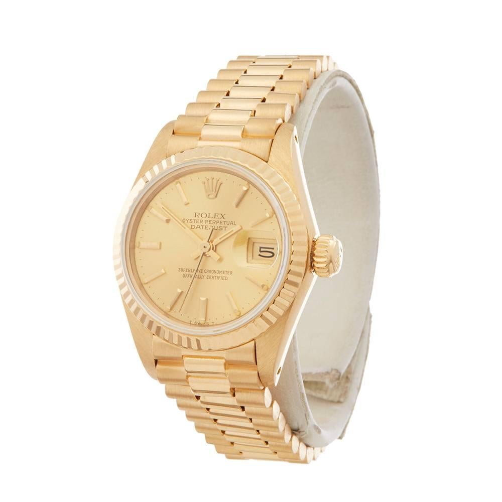 Ref: W5022
Manufacturer: Rolex
Model: Datejust
Model Ref: 6917
Age: 
Gender: Ladies
Complete With: Xupes Presenation Pouch
Dial: Champagne Baton
Glass: Sapphire Crystal
Movement: Automatic
Water Resistance: To Manufacturers Specifications
Case: 18k