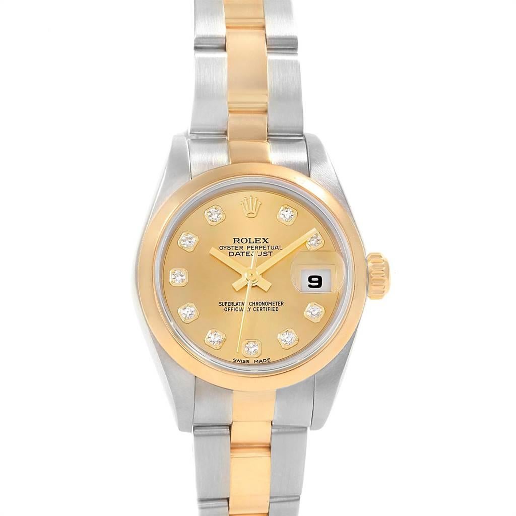 Rolex Datejust 26 Ladies Steel Yellow Gold Diamond Ladies Watch 79163. Officially certified chronometer self-winding movement. Stainless steel oyster case 26 mm in diameter. Rolex logo on a 18k yellow gold crown. 18k yellow gold smooth domed bezel.