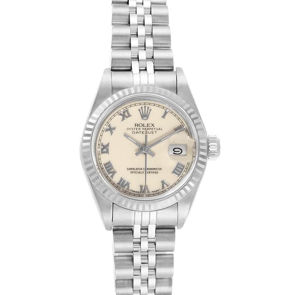 Rolex Datejust 26 Steel White Gold Ivory Roman Dial Ladies Watch 69174. Officially certified chronometer self-winding movement. Stainless steel oyster case 26.0 mm in diameter. Rolex logo on a crown. 18k white gold fluted bezel. Scratch resistant
