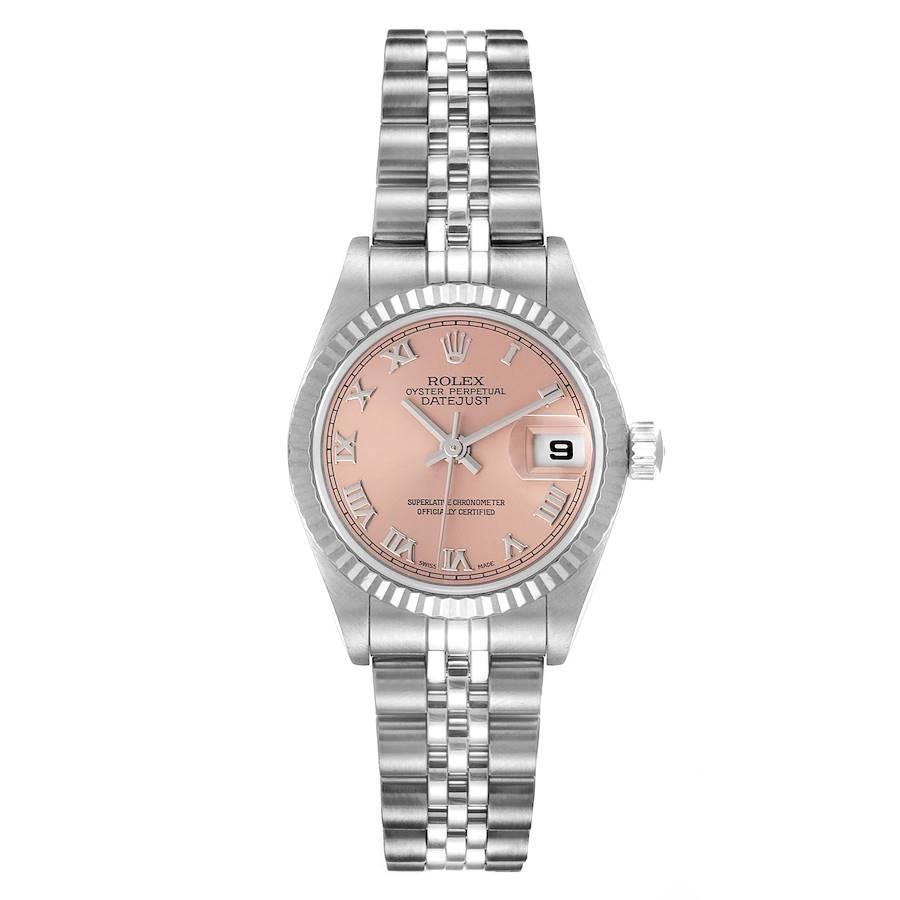 Rolex Datejust 26 Steel White Gold Salmon Dial Ladies Watch 79174. Officially certified chronometer self-winding movement. Stainless steel oyster case 26.0 mm in diameter. Rolex logo on a crown. 18k white gold fluted bezel. Scratch resistant