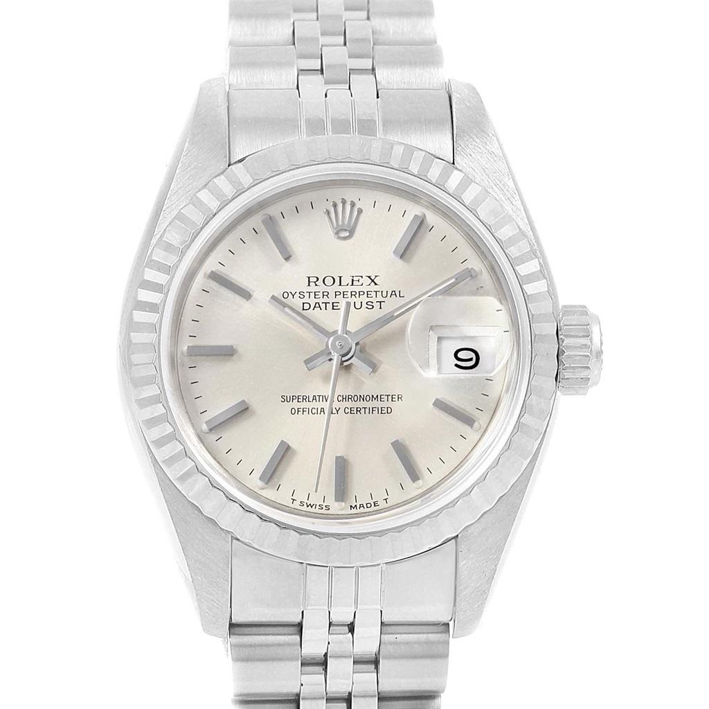 Rolex Datejust 26 Steel White Gold Silver Dial Ladies Watch 69174. Officially certified chronometer automatic self-winding movement. Stainless steel oyster case 26 mm in diameter. Rolex logo on a crown. 18k white gold fluted bezel. Scratch resistant