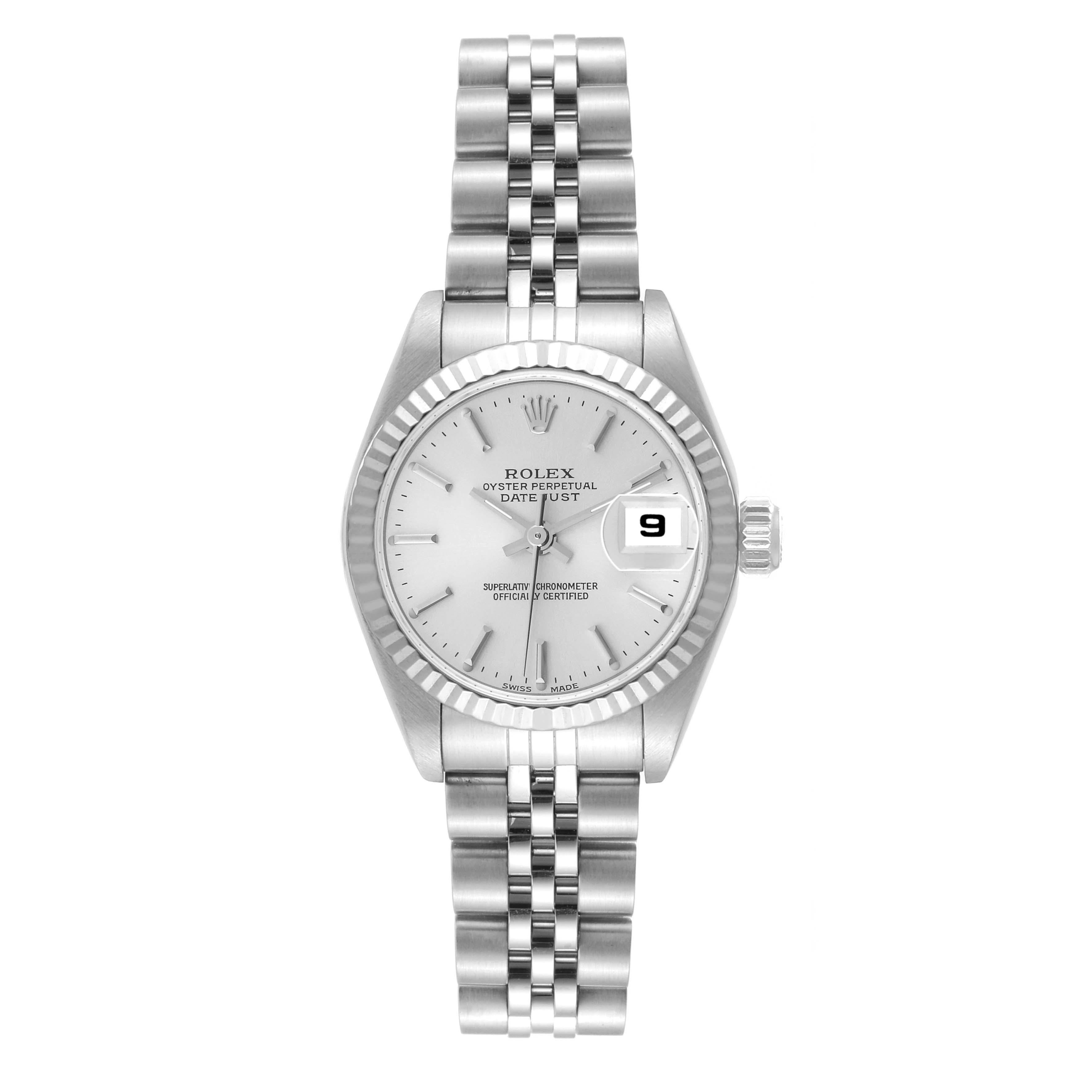 Rolex Datejust 26 Steel White Gold Silver Dial Ladies Watch 79174. Officially certified chronometer automatic self-winding movement. Stainless steel oyster case 26.0 mm in diameter. Rolex logo on a crown. 18k white gold fluted bezel. Scratch
