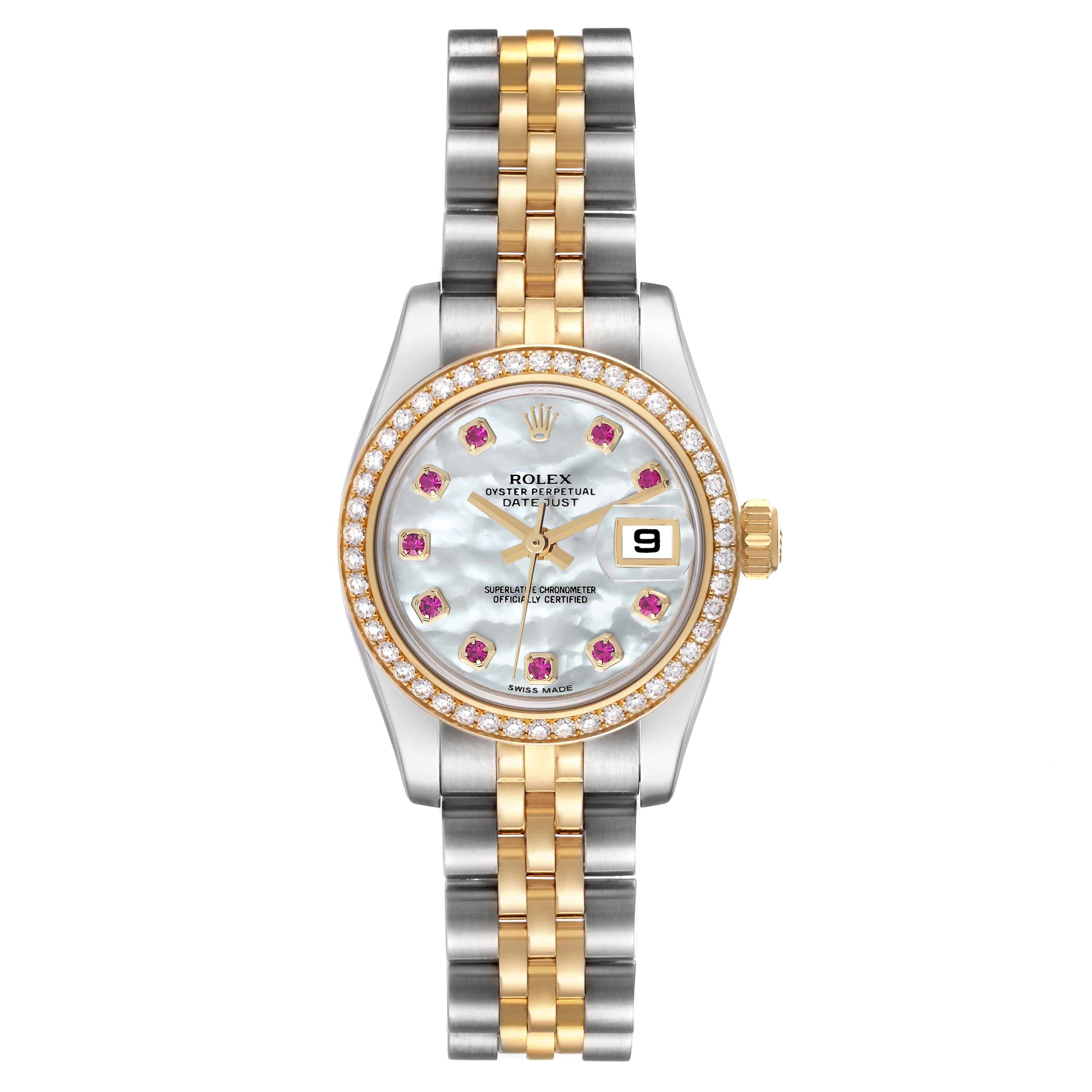 Rolex Datejust 26 Steel Yellow Gold Mother Of Pearl Ruby Diamond Ladies Watch 179383. Officially certified chronometer self-winding movement. Stainless steel oyster case 26.0 mm in diameter. Rolex logo on a 18K yellow gold crown. 18k yellow gold