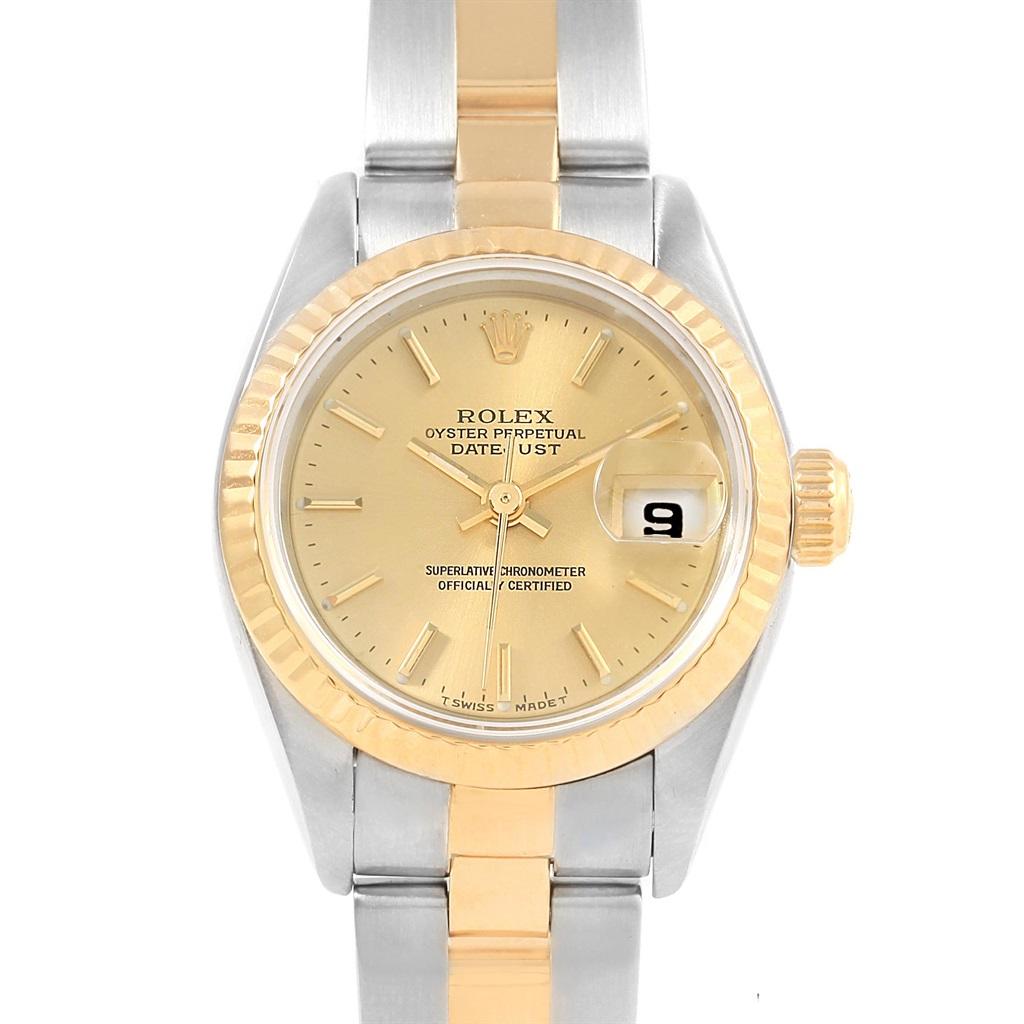 Rolex Datejust 26 Steel Yellow Gold Oyster Bracelet Ladies Watch 69173. Officially certified chronometer automatic self-winding movement. 1995 - 1996. 18k yellow gold fluted bezel. Scratch resistant sapphire crystal with cyclops magnifyer. Champagne