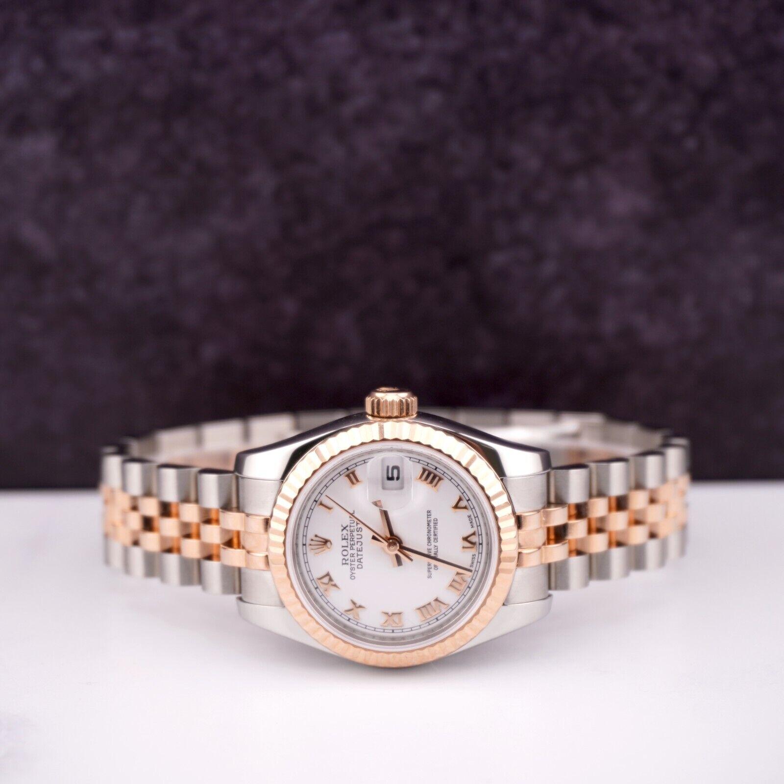 Rolex Datejust 26mm Watch

Pre-owned w/ Original Box & Card
100% Authentic Authenticity Card
Condition - (Excellent Condition) - See Pics
Watch Reference - 179171
Model - Datejust
Dial Color - White
Material - 18k Rose Gold/Stainless Steel
Watch