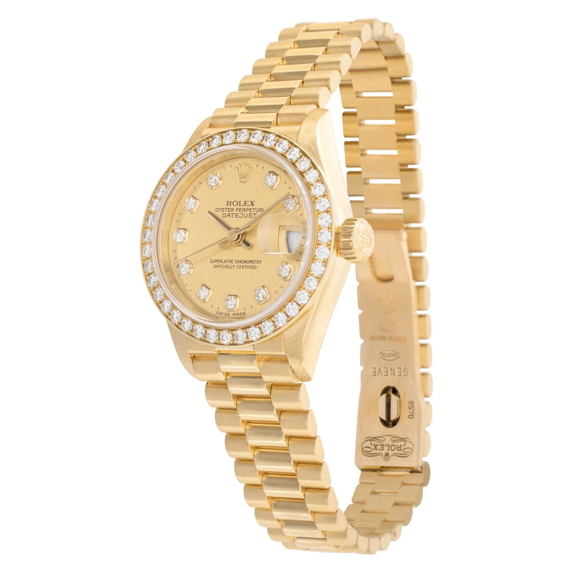 Rolex Datejust in 18k yellow gold with factory orginal diamond bezel & diamond dial. Auto w/ sweep seconds and date. 26 mm case size. With papers. **Bank wire only at this price** Ref 79138. Circa 2000. Fine Pre-owned Rolex Watch.

Certified
