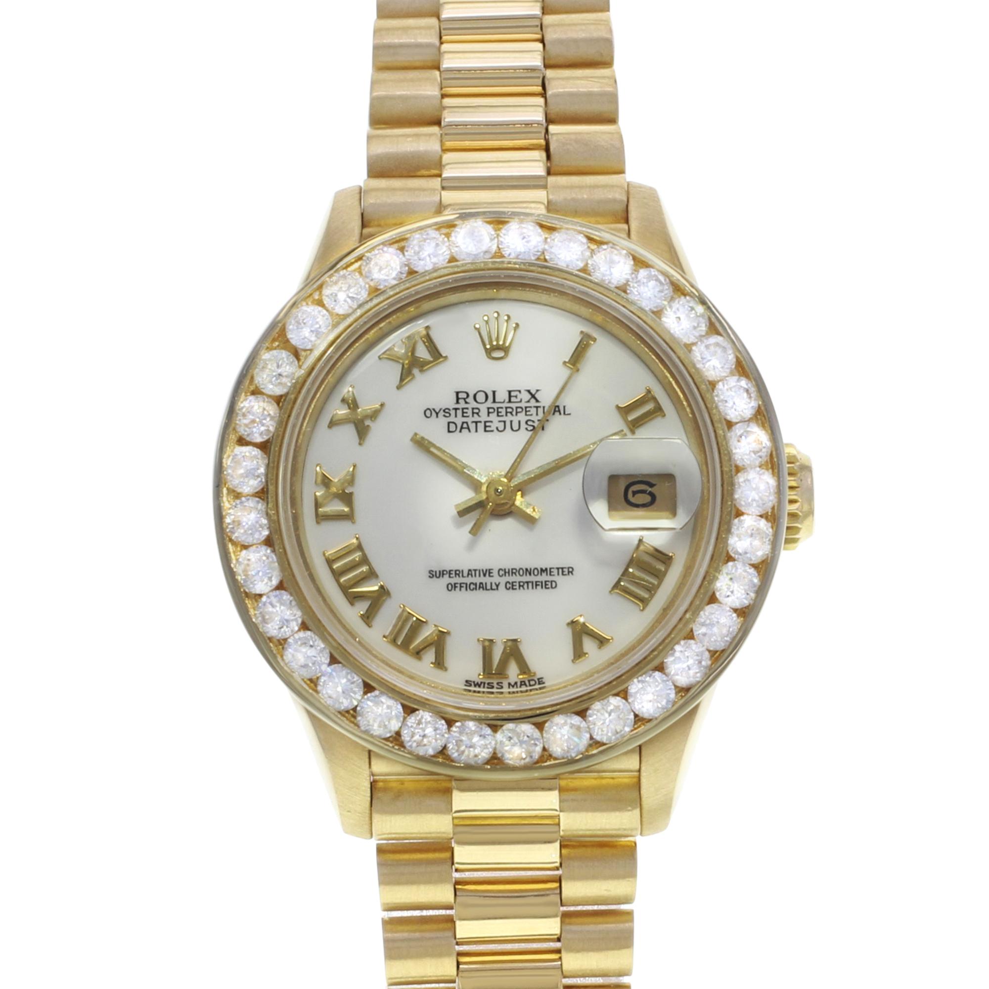 Custom Diamond bezel. Approx 1.20 Cttw Diamonds. The band had minor slack. Original Box and Papers are not included comes with a Chronostore presentation box and authenticity card.
Details:
Brand Rolex
Color Gold
Department Women
Model Number