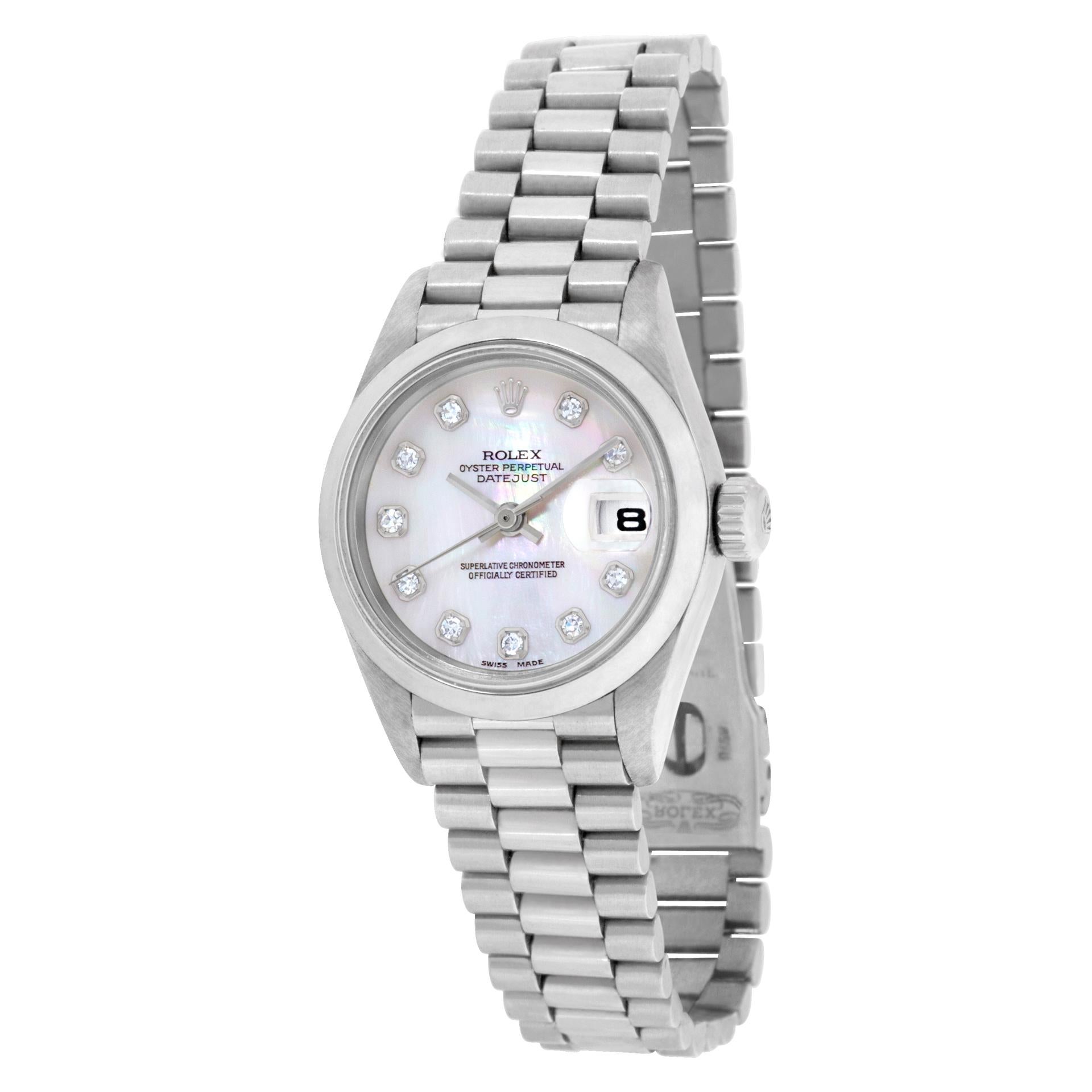 Ladies Rolex Datejust in platinum with  factory original mother of pearl diamond dial on a President band. Auto w/ sweep seconds and date. 26 mm case size. with box. Ref 69166. Circa 1999. **Bank wire only at this price** Fine Pre-owned Rolex Watch.