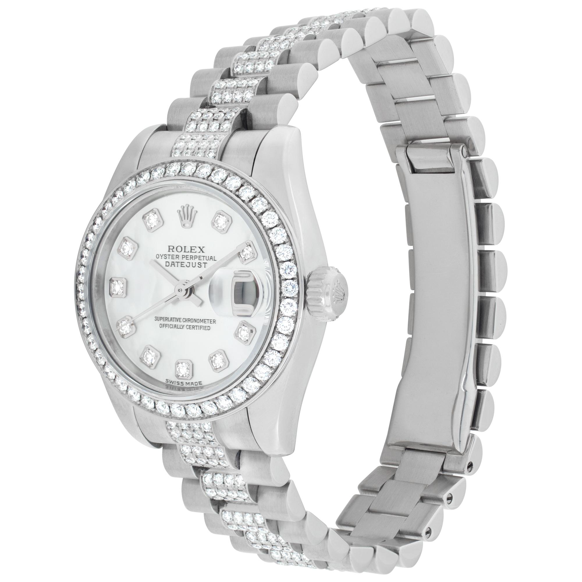 Crown Collection Rolex Datejust in platinum with factory original diamond president bracelet, diamond bezel and mother of pearl diamond dial. Automatic w/ sweep seconds and date. 26 mm case size. Prestine condition with box and papers. Circa 2005. 