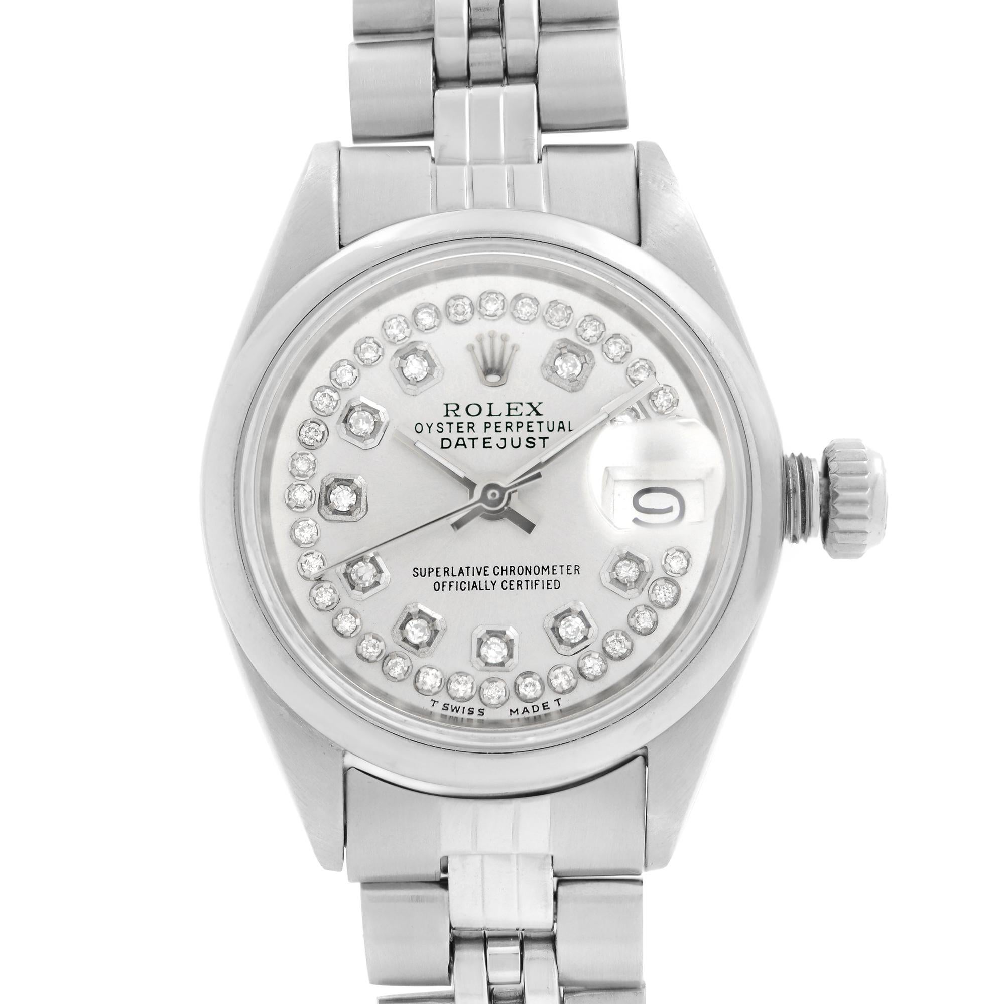 Pre-owned Vintage Rolex Datejust 26mm Steel Custom Diamond Silver Dial Automatic Ladies Watch 6916. Watch Was Produced in 1973. The Watch Band Has a Major Slack. The Case and Bezel Show Micro Dinges on the Edges. This Watch Has an Aftermarket Dial