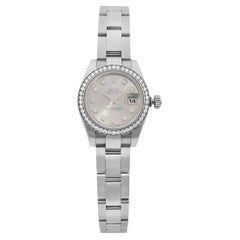 Rolex Datejust Damenuhr aus Stahl mit Gold-Diamant-Lünette und Silber-Zifferblatt 179384