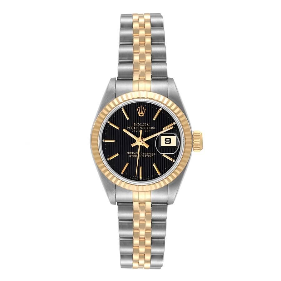 Rolex Datejust 26mm Steel Yellow Gold Black Tapestry Dial Ladies Watch 69173. Officially certified chronometer automatic self-winding movement. Stainless steel oyster case 26.0 mm in diameter. Rolex logo on an 18K yellow gold crown. 18k yellow gold