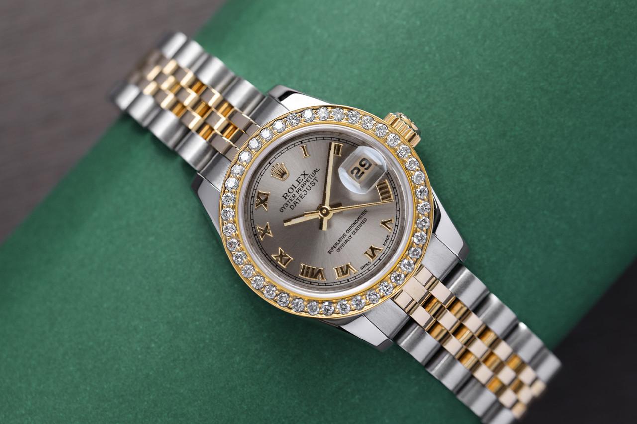 Rolex Datejust 26mm Steel & Yellow Gold Ladies Watch with Factory Grey Roman Numerals Dial 179173

EXCELLENT CONDITION, TIGHT BAND. We are a premiere distributor of pre-owned and new watches, where we guarantee complete authenticity and