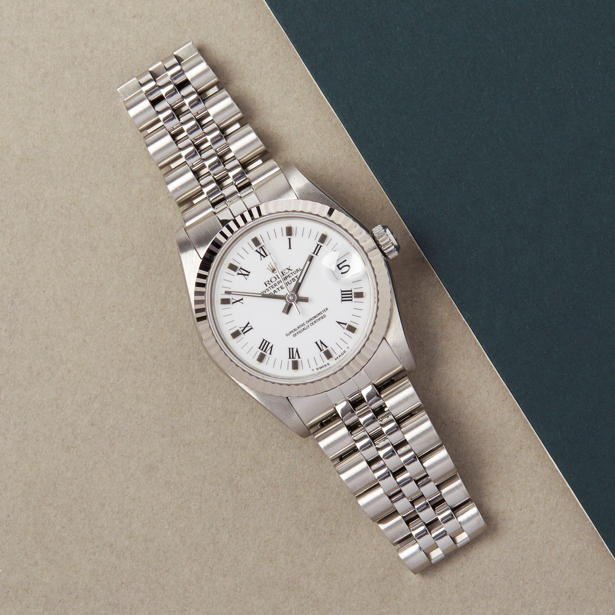 Xupes Reference: W007624
Manufacturer: Rolex
Model: Datejust
Model Variant: 31
Model Number: 68274
Age: 1990
Gender: Ladies
Complete With: Rolex Box 
Dial: White Roman
Glass: Sapphire Crystal
Case Size: 31mm
Case Material: Stainless Steel & White