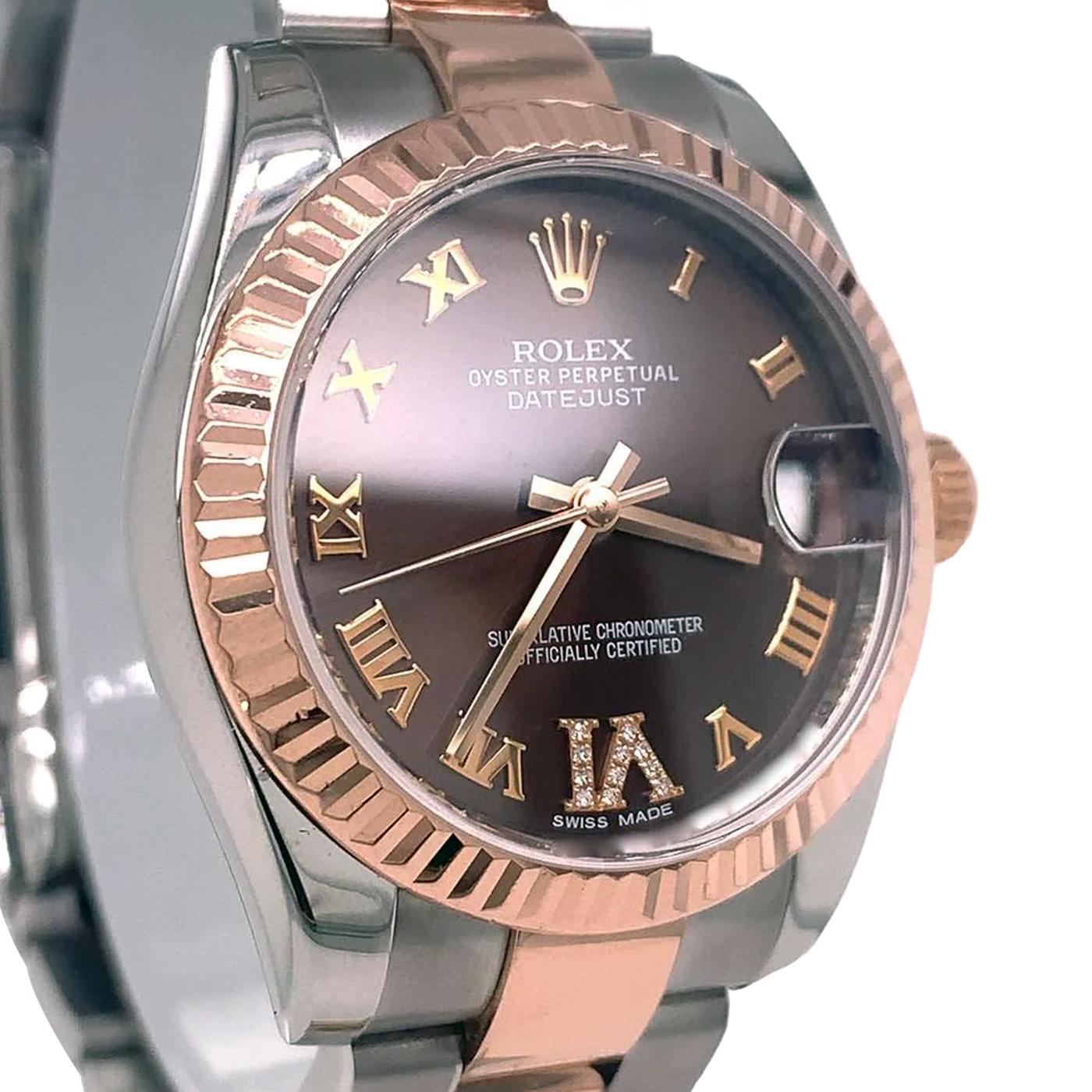 Stainless steel case with stainless steel and 18kt rose gold bracelet. Fluted 18kt rose gold bezel. Chocolate dial with rose-gold tone hands and VI Diamond numeral hour markers. Minute markers around the outer rim. Dial Type: Analog. The date is