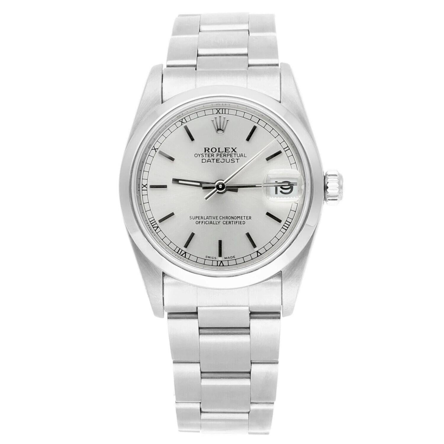 Silver-tone stainless steel case with a silver-tone stainless steel oyster bracelet. Fixed silver-tone stainless steel bezel. Silver-tone dial with silver-tone hands and index hour markers. Minute markers around the outer rim. Dial Type: Analog.