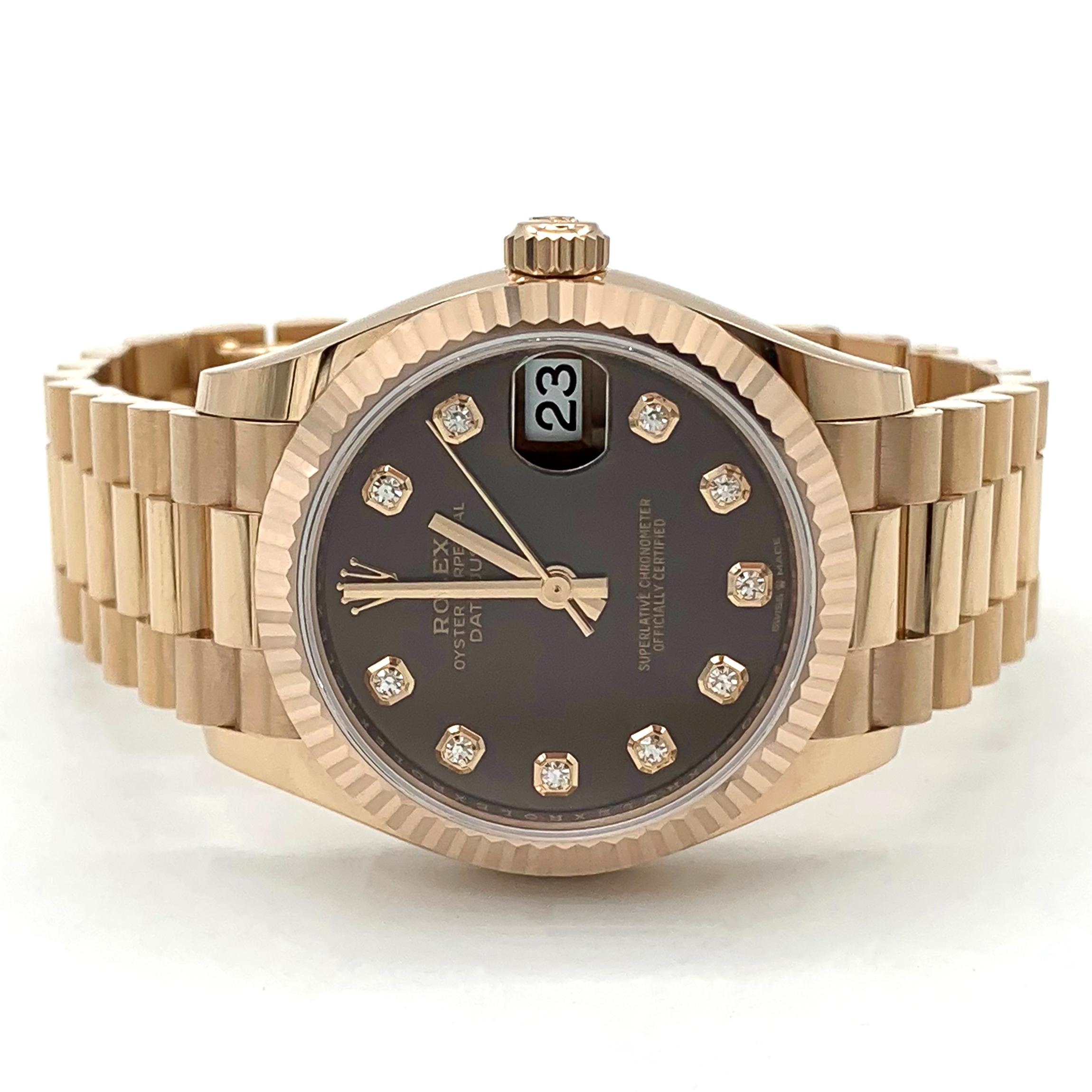Rolex Everose Gold Datejust 31 Watch - Fluted Bezel - Chocolate Diamond Dial - President Bracelet

31mm 18K Everose gold case, screw-down crown with twinlock double waterproofness system, fluted bezel, scratch-resistant sapphire crystal with cyclops