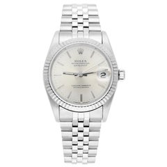 Rolex Datejust 31 Esfera índice plateada Reloj de acero inoxidable Bisel de oro blanco 68274