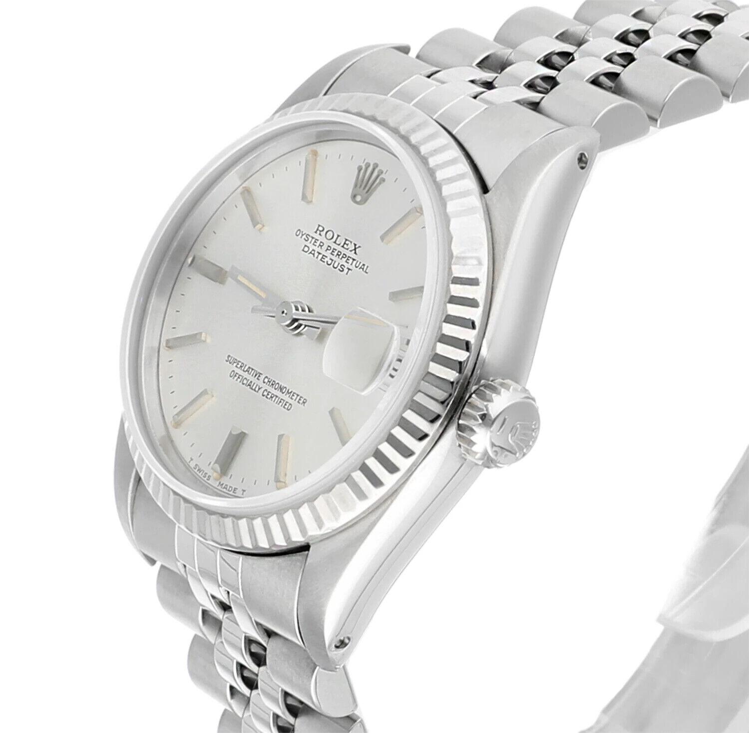 Rolex Datejust 31 Silver Stick Dial Stainless Steel Watch White Gold Bezel 68274 In Excellent Condition For Sale In New York, NY