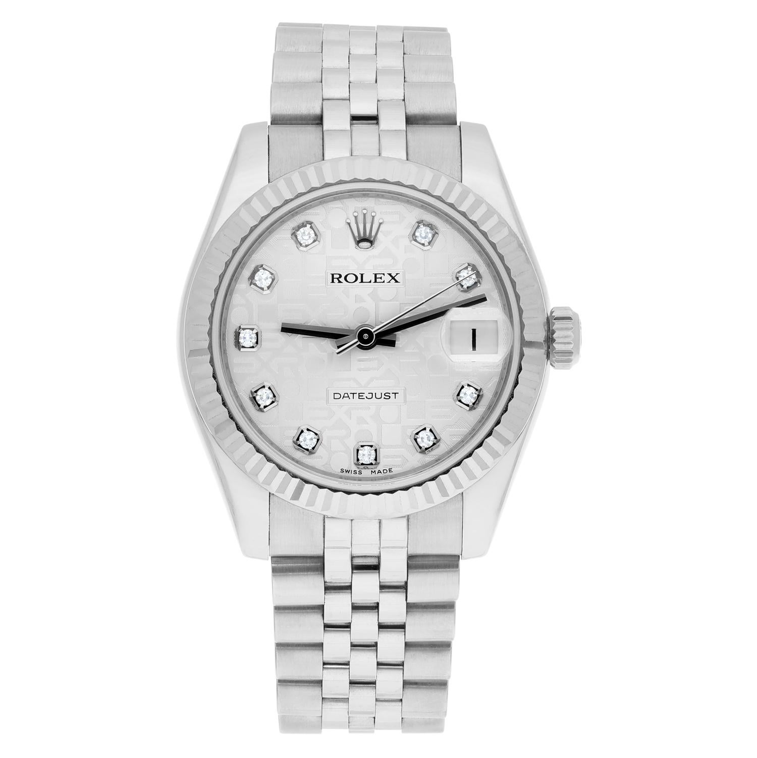 This luxurious Rolex Datejust wristwatch is a stunning piece of jewelry and a true work of art. It features a 31mm silver case with a fluted bezel and a solid caseback. The watch is powered by a mechanical (automatic) movement and has a water