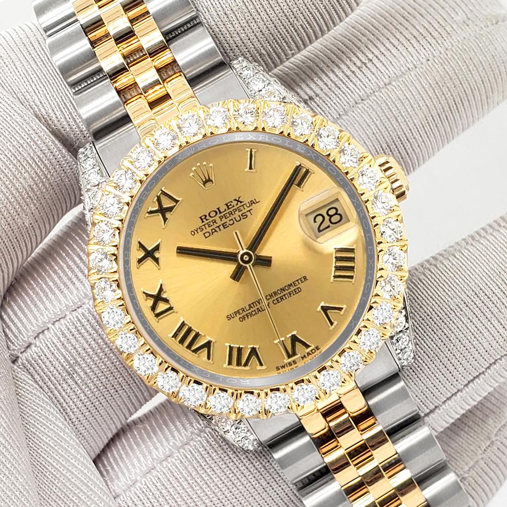 ElegantSwiss is delighted to offer you this Rolex Datejust midsize 31mm 2-Tone champagne roman with 4.4ct diamond bezel/case (diamonds are not set by Rolex) yellow gold and stainless steel jubilee watch, Ref 178273.

Excellent, pristine condition,
