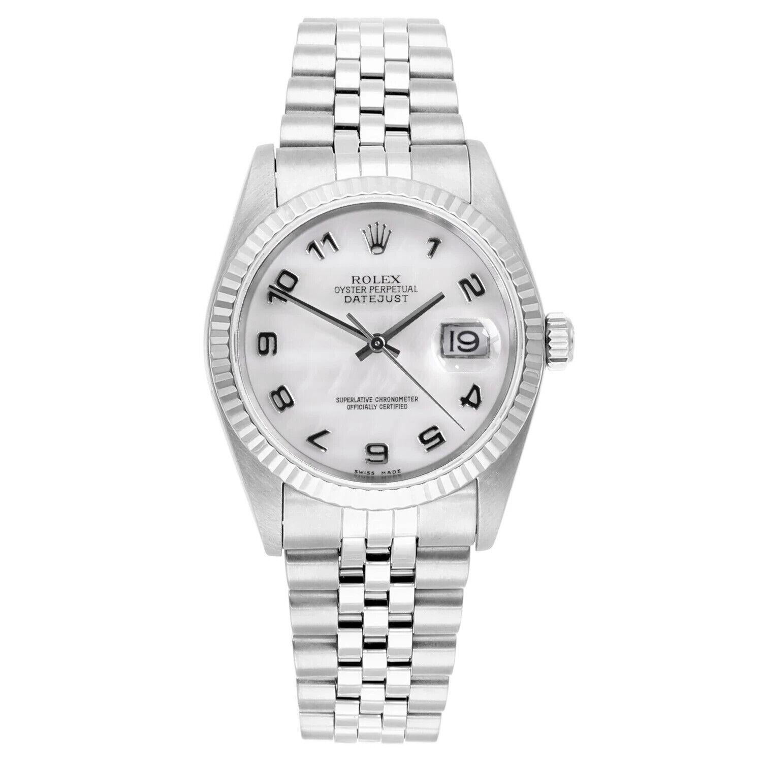 Silver-tone stainless steel case with a silver-tone stainless steel jubilee bracelet. Fixed 18kt white gold bezel. White mother of pearl dial with silver-tone hands and Roman numeral hour markers. Minute markers around the outer rim. Dial Type: